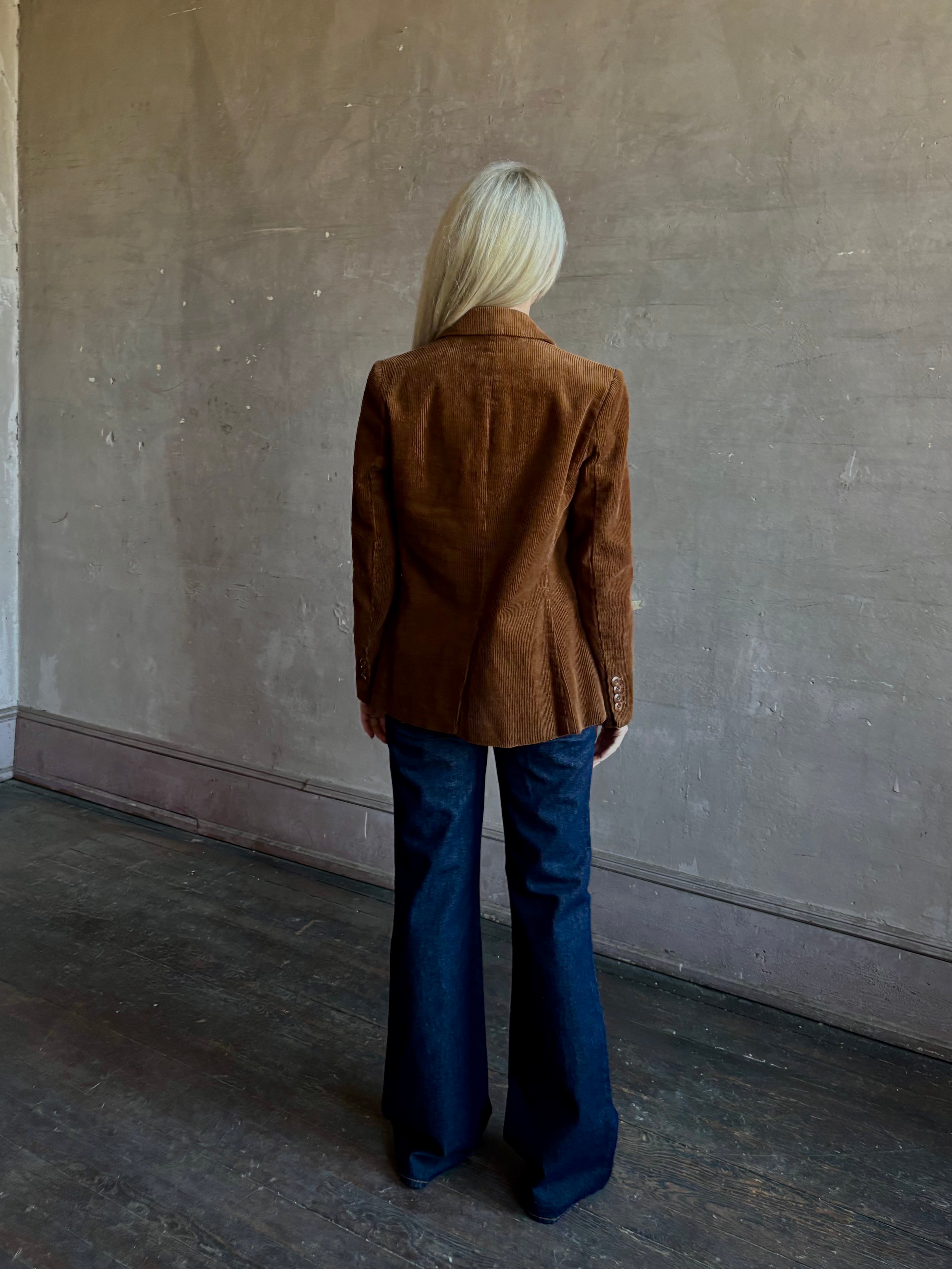 Mature woman wearing Trovata Skylar Cotton Corduroy Two Button Blazer in Walnut Brown front pockets heritage-inspired California tailoring