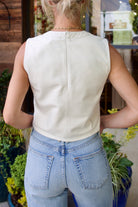 Woman wearing contemporary luxury fashion TWP lamb skin off white Leather Tank top  elevated casual wear
