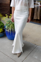 Image of a woman wearing the TWP My Endless Love Skirt