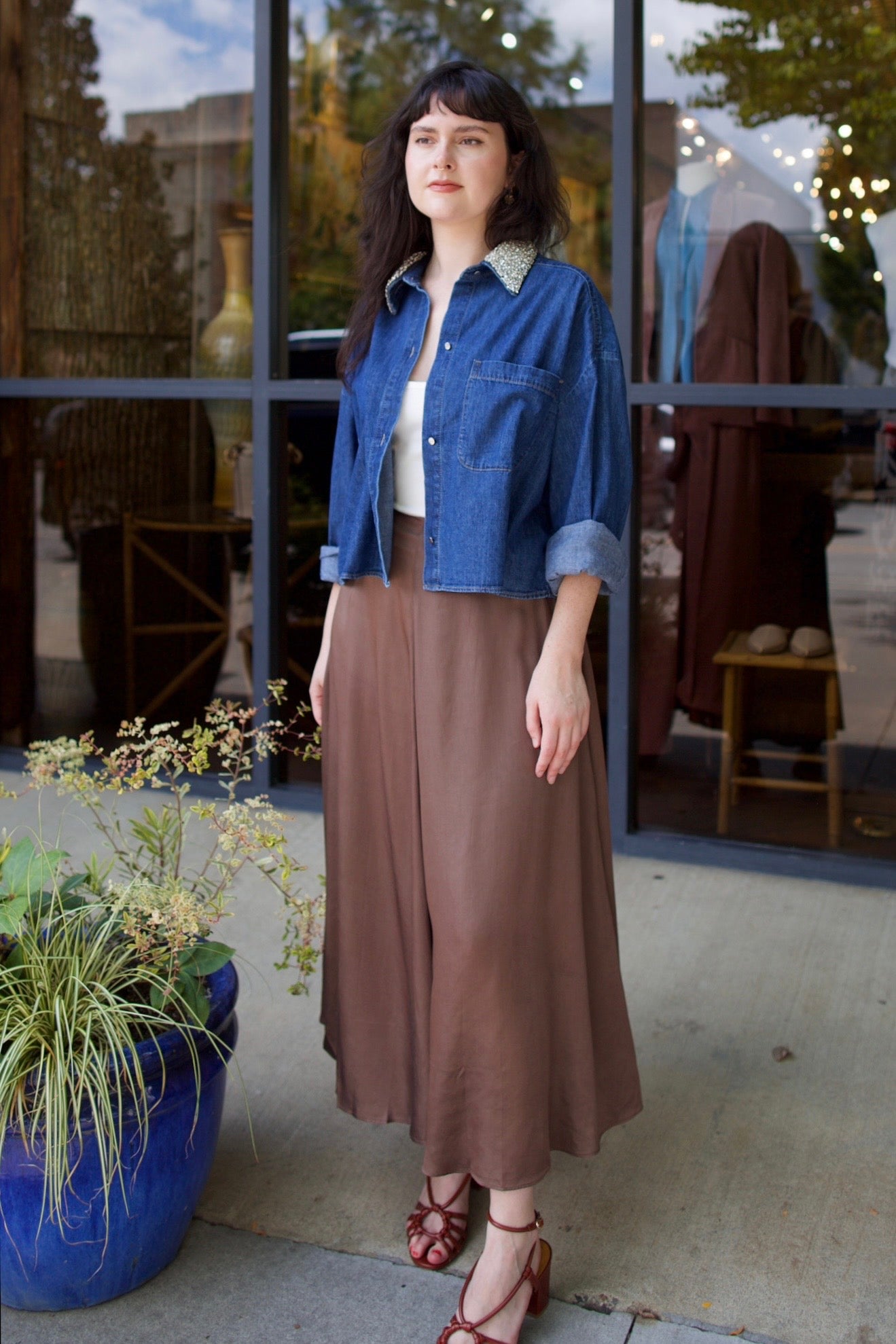 Model wearing a timeless classic tailoring Primavera skirt in a sophisticated neutral by Apiece Apart 