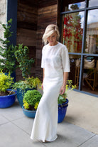 Image of a woman wearing the TWP New Ex T and My Endless Love Skirt