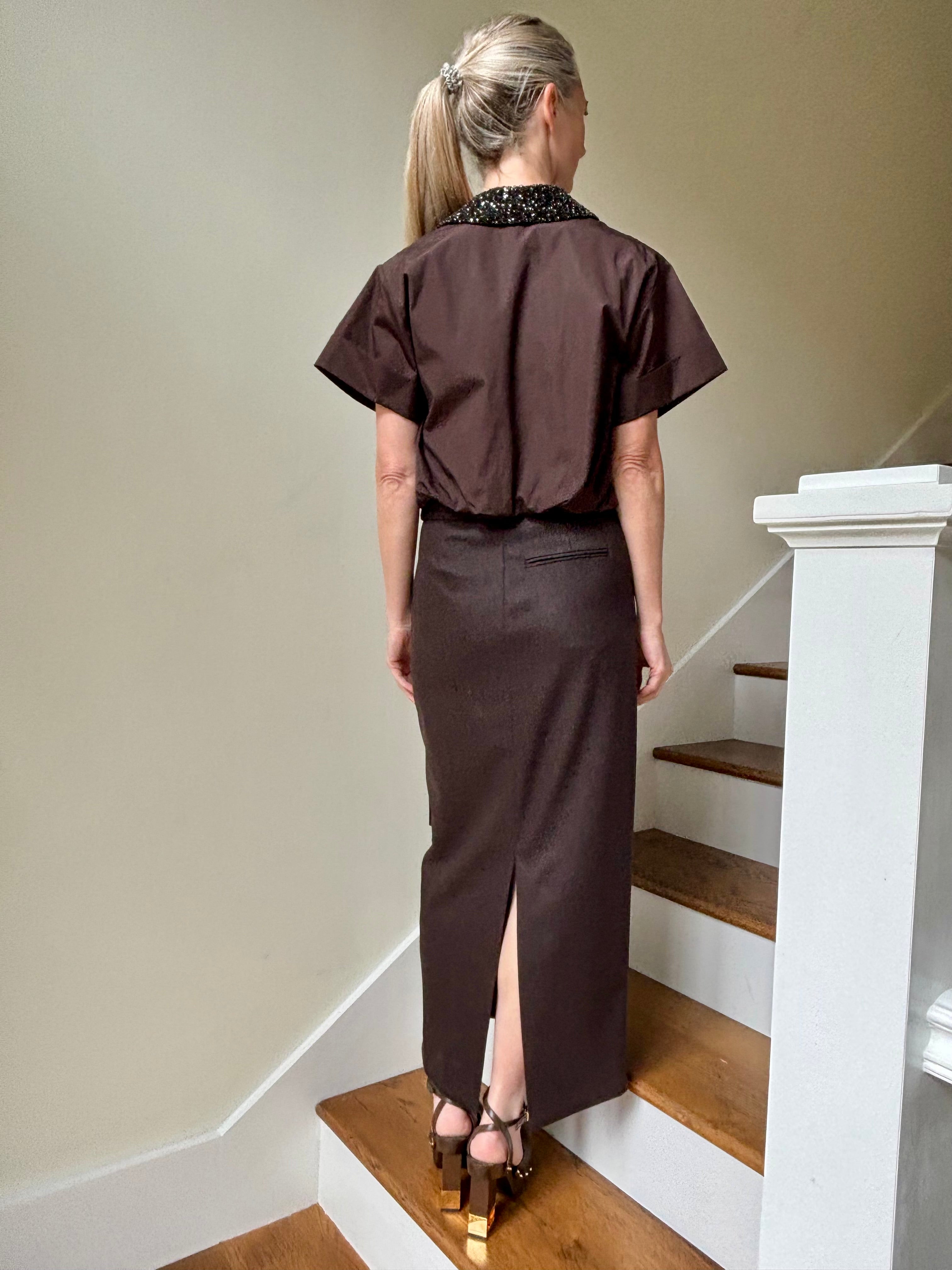 Image of mature woman wearing luxury TWP premium cotton blouse with a crystal collar in a rich chocolate color that's reversible