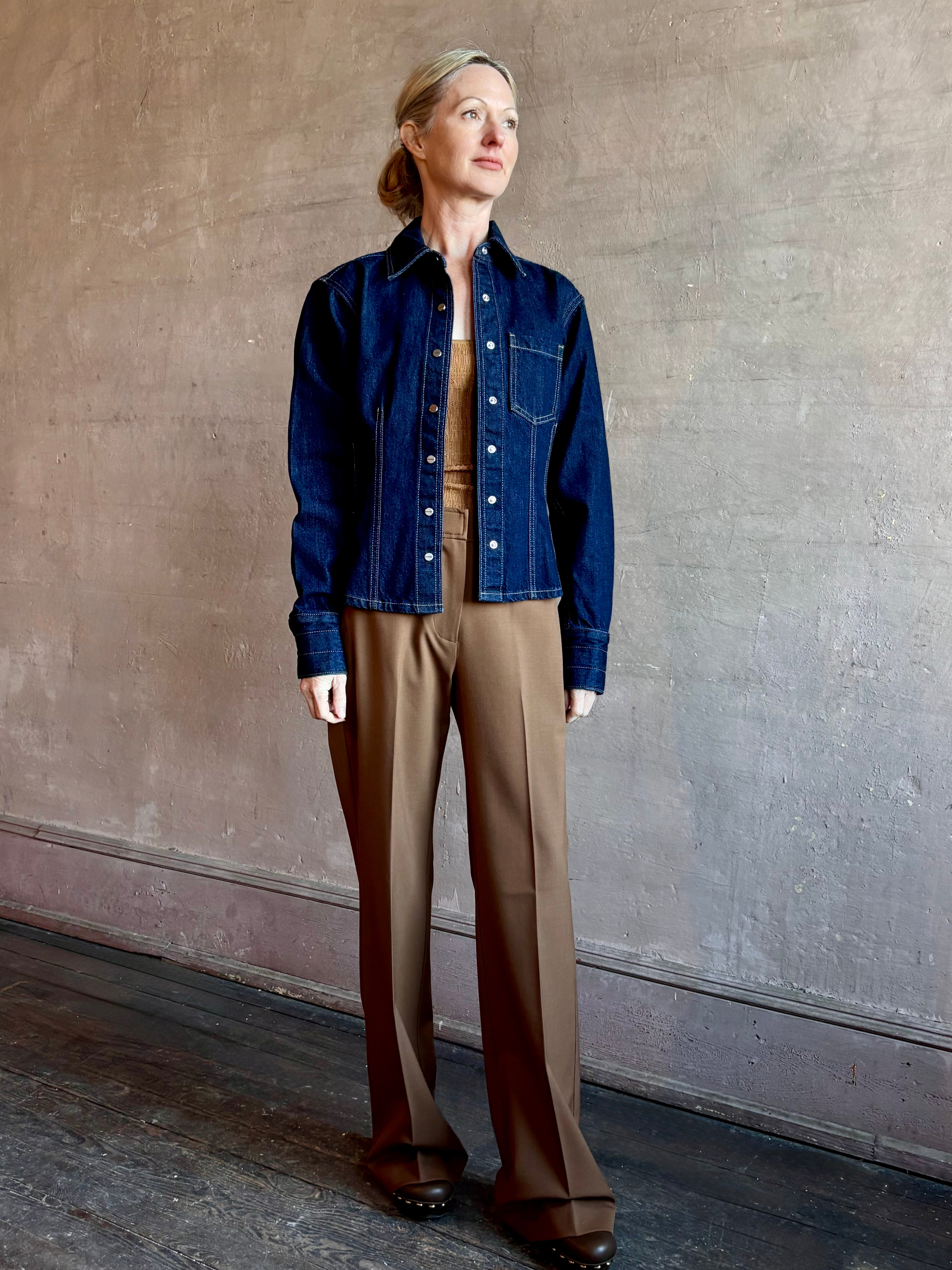 Image of woman wearing Premium Cotton American-Made Denim TWP Franny Shirt with feminine darting silhouette at waist