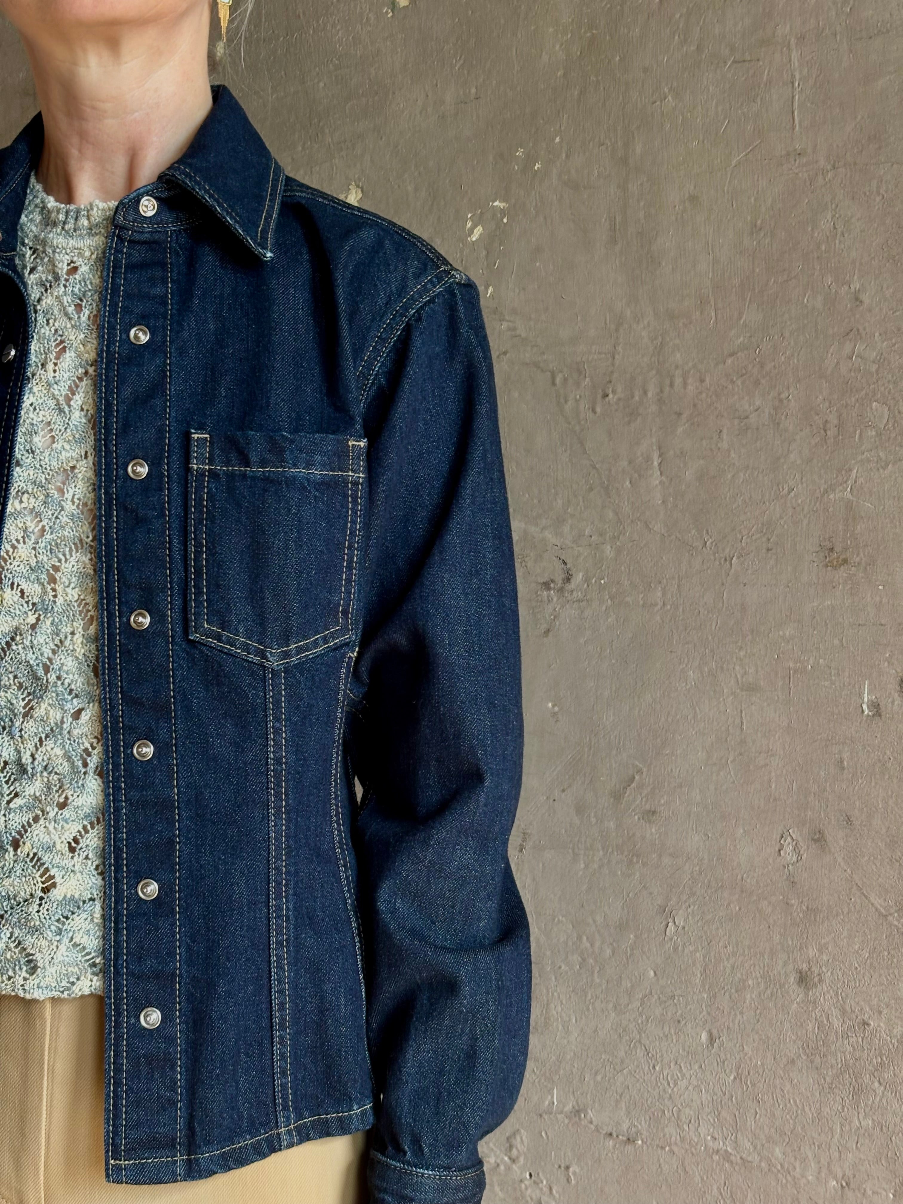 Mature woman wearing Premium Cotton American-Made Denim TWP Franny Shirt with feminine darting silhouette 