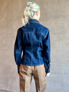 Image of woman wearing Premium Cotton American-Made Denim TWP Franny Shirt with feminine darting silhouette at waist