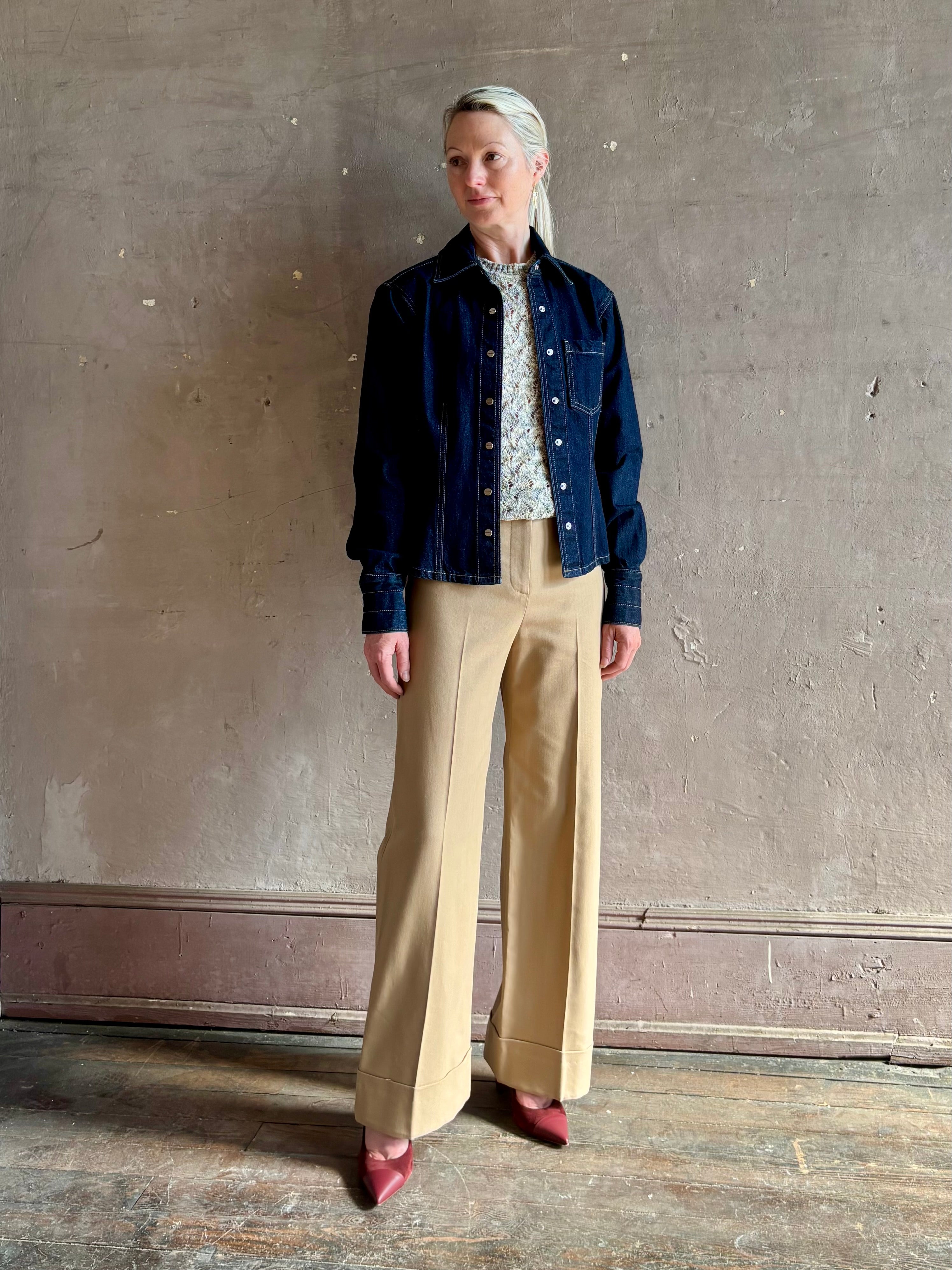 Mature woman wearing Premium Cotton American-Made Denim TWP Franny Shirt with feminine darting silhouette 