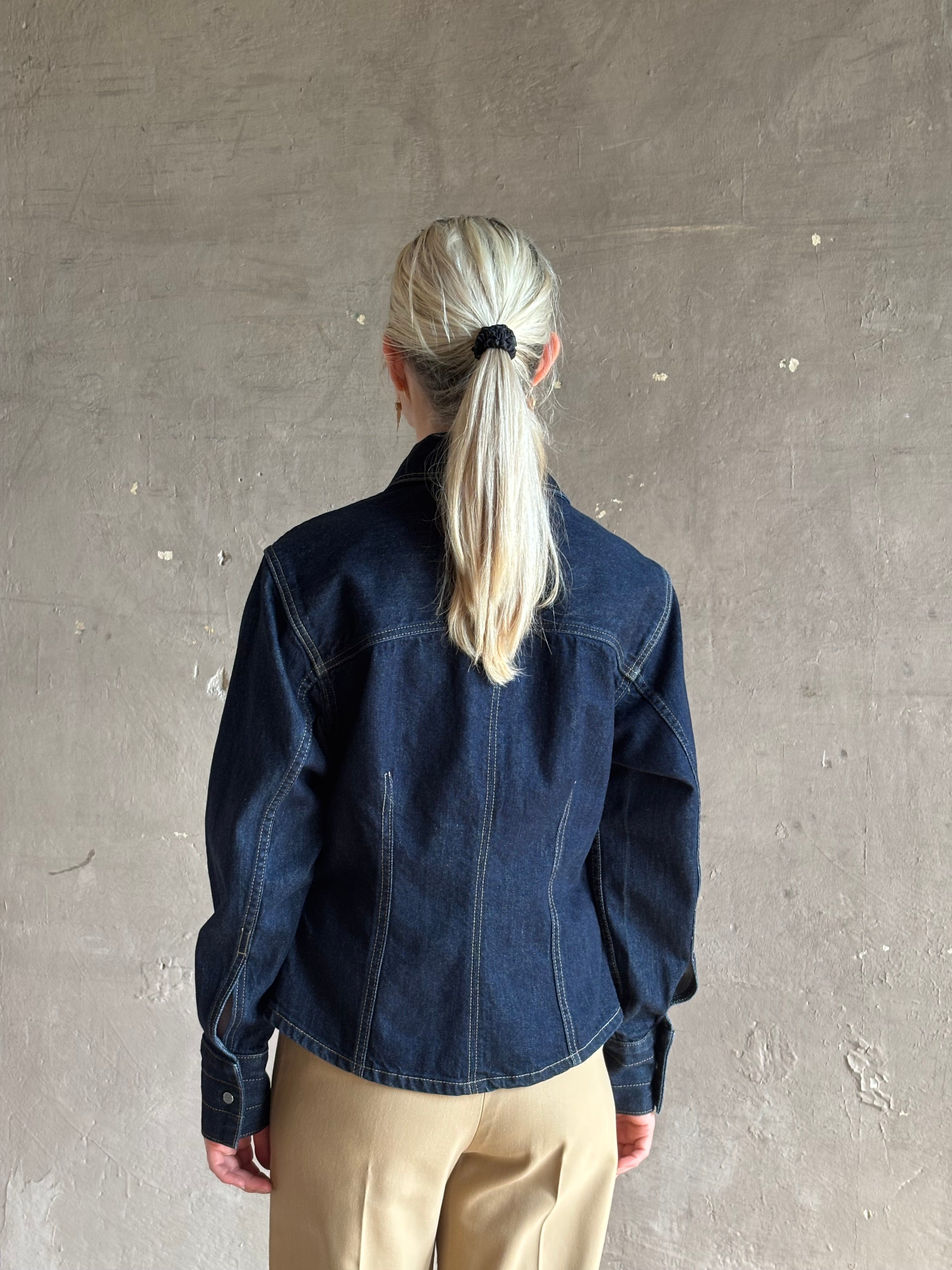 Mature woman wearing Premium Cotton American-Made Denim TWP Franny Shirt with feminine darting silhouette 
