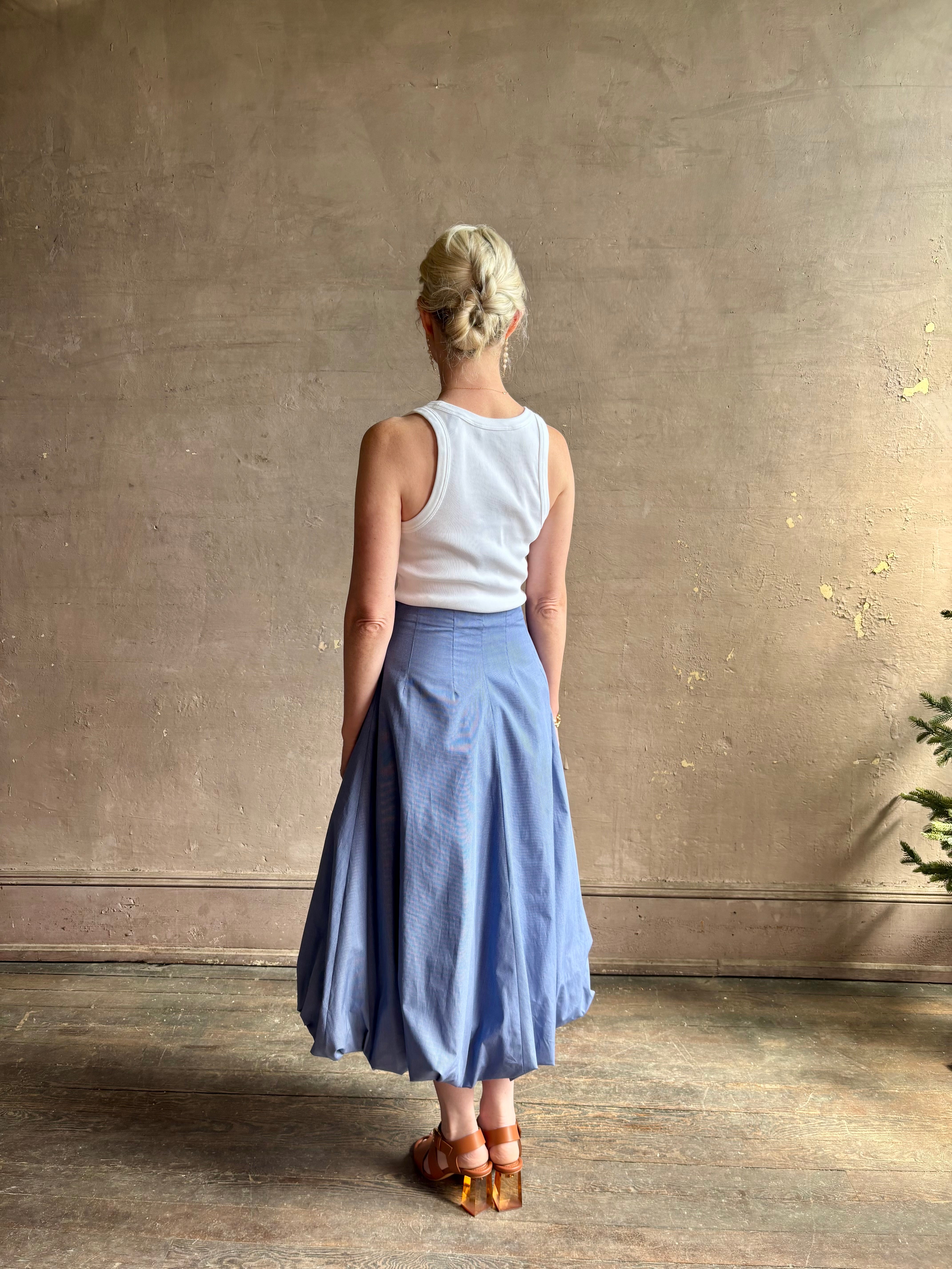 Mature woman wearing American made cotton poplin TWP blue plaid Full Intentions midi bubble Skirt with drop waist