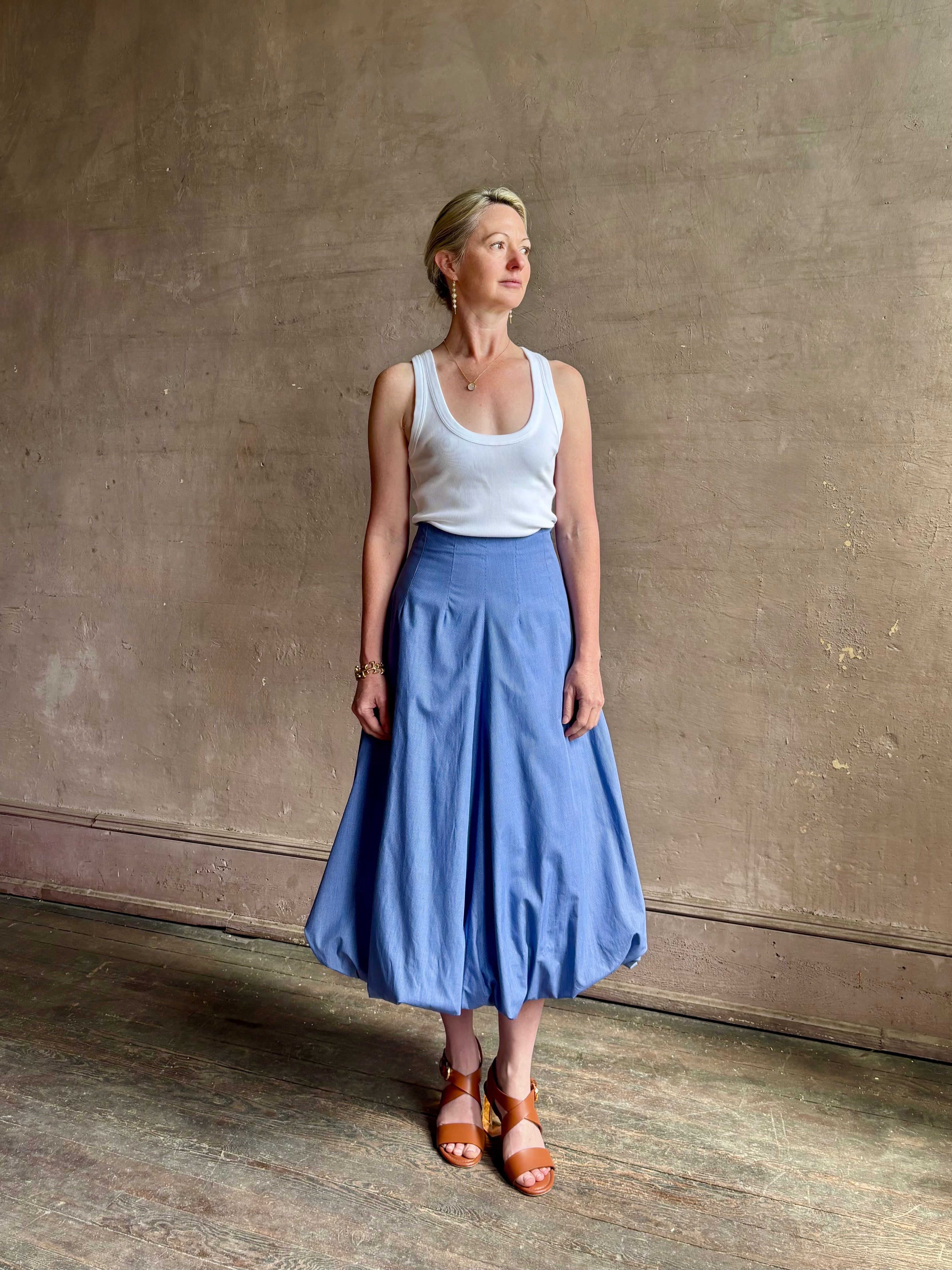 Mature woman wearing American made cotton poplin TWP blue plaid Full Intentions midi bubble Skirt with drop waist