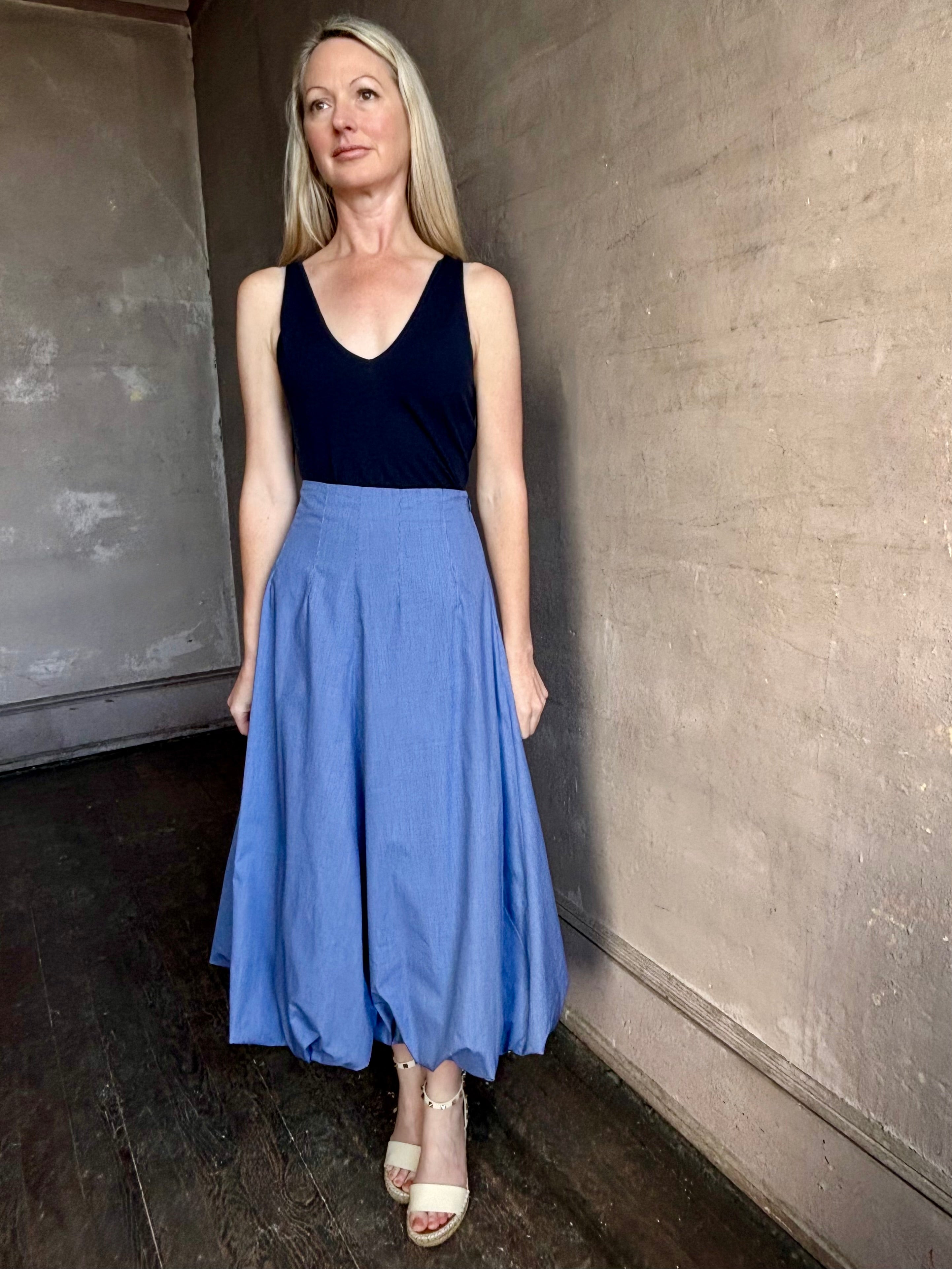 Image of woman wearing American made cotton poplin TWP blue plaid Full Intentions maxi bubble Skirt