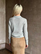 woman wearing light heather grey TWP Jorden Polo Henley premium cashmere  elevated casual wear comfy long sleeve