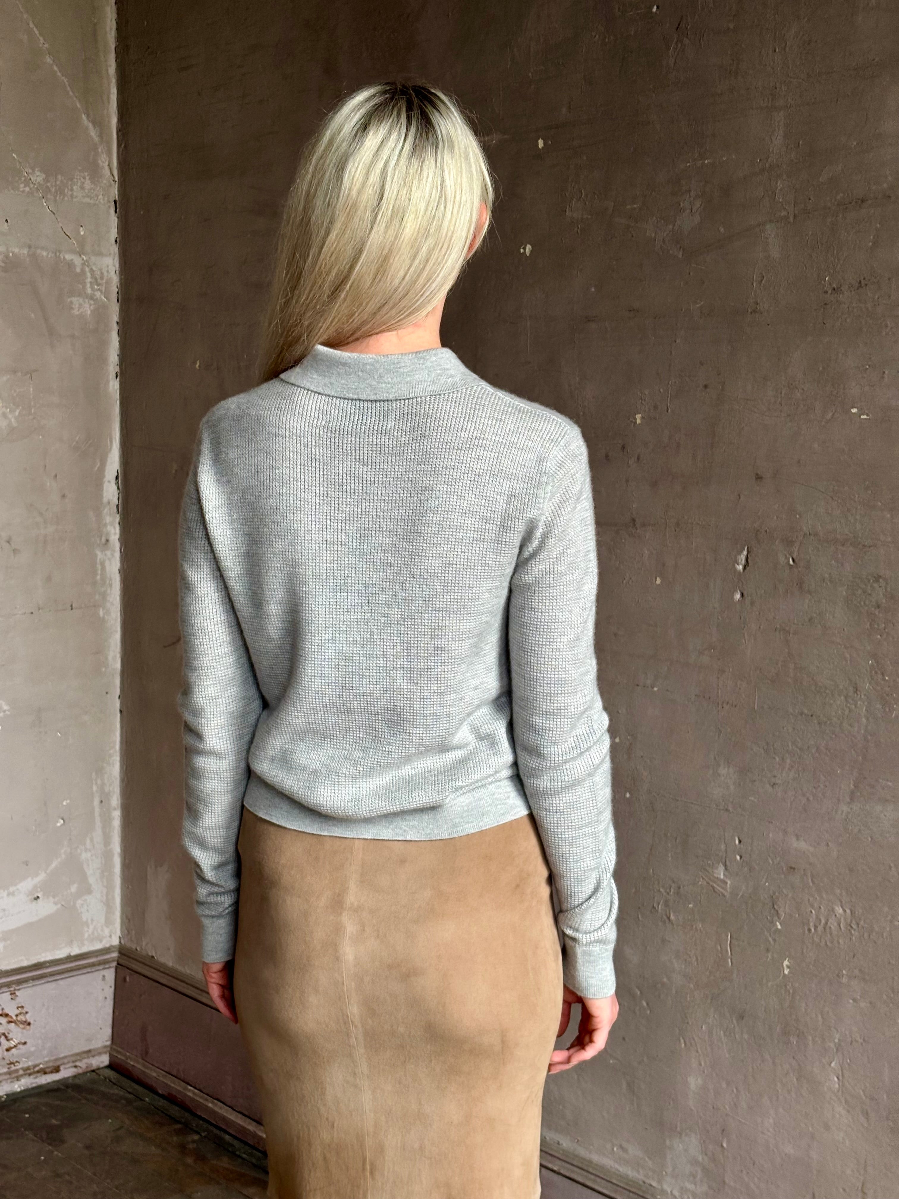 woman wearing light heather grey TWP Jorden Polo Henley premium cashmere  elevated casual wear comfy long sleeve