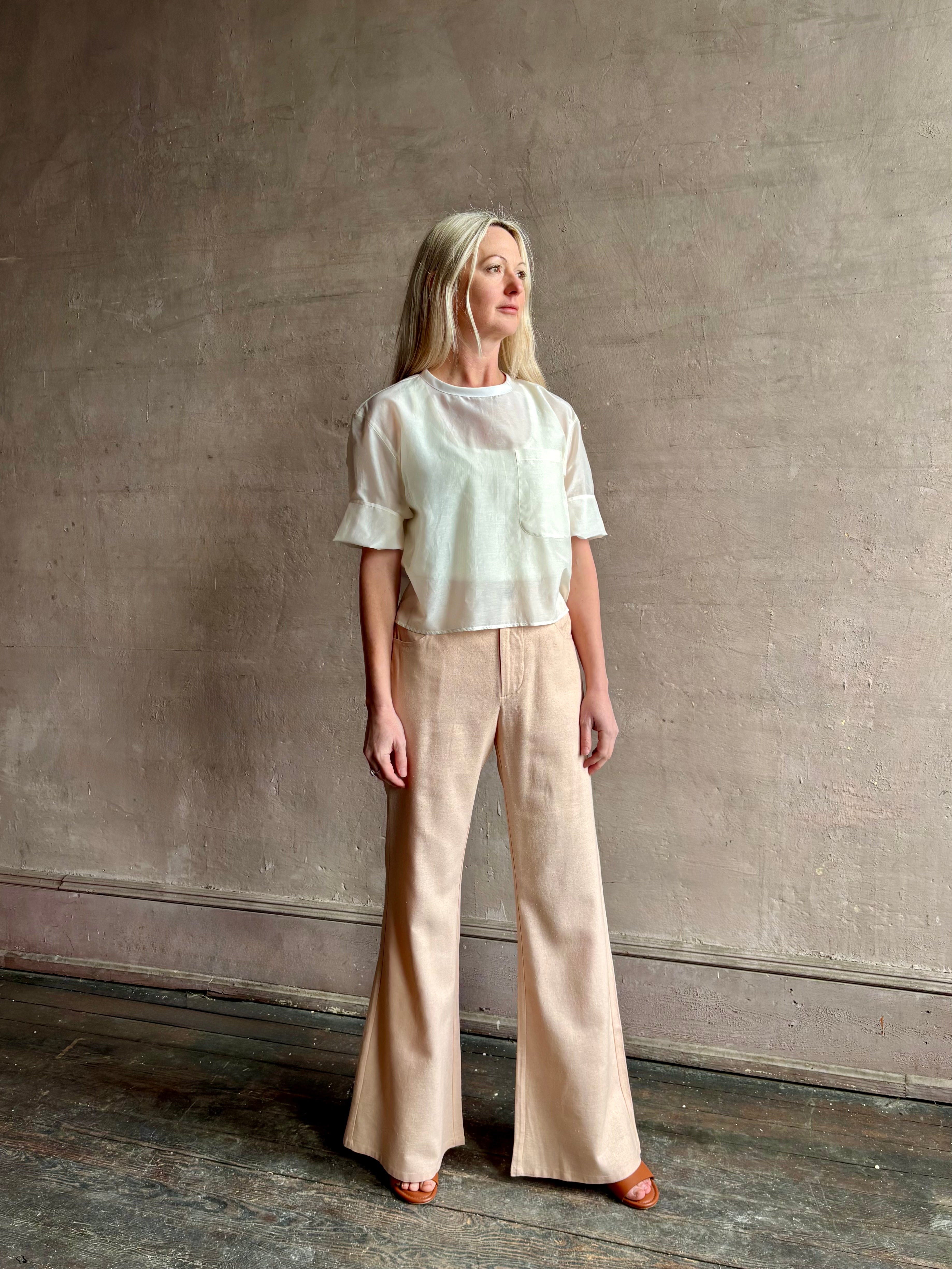 Mature woman wearing TWP New Ex T top in an Ivory lightweight cotton silk blend with short sleeves crew neck 