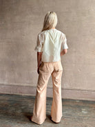 Mature woman wearing TWP New Ex T top in an Ivory lightweight cotton silk blend with short sleeves crew neck 
