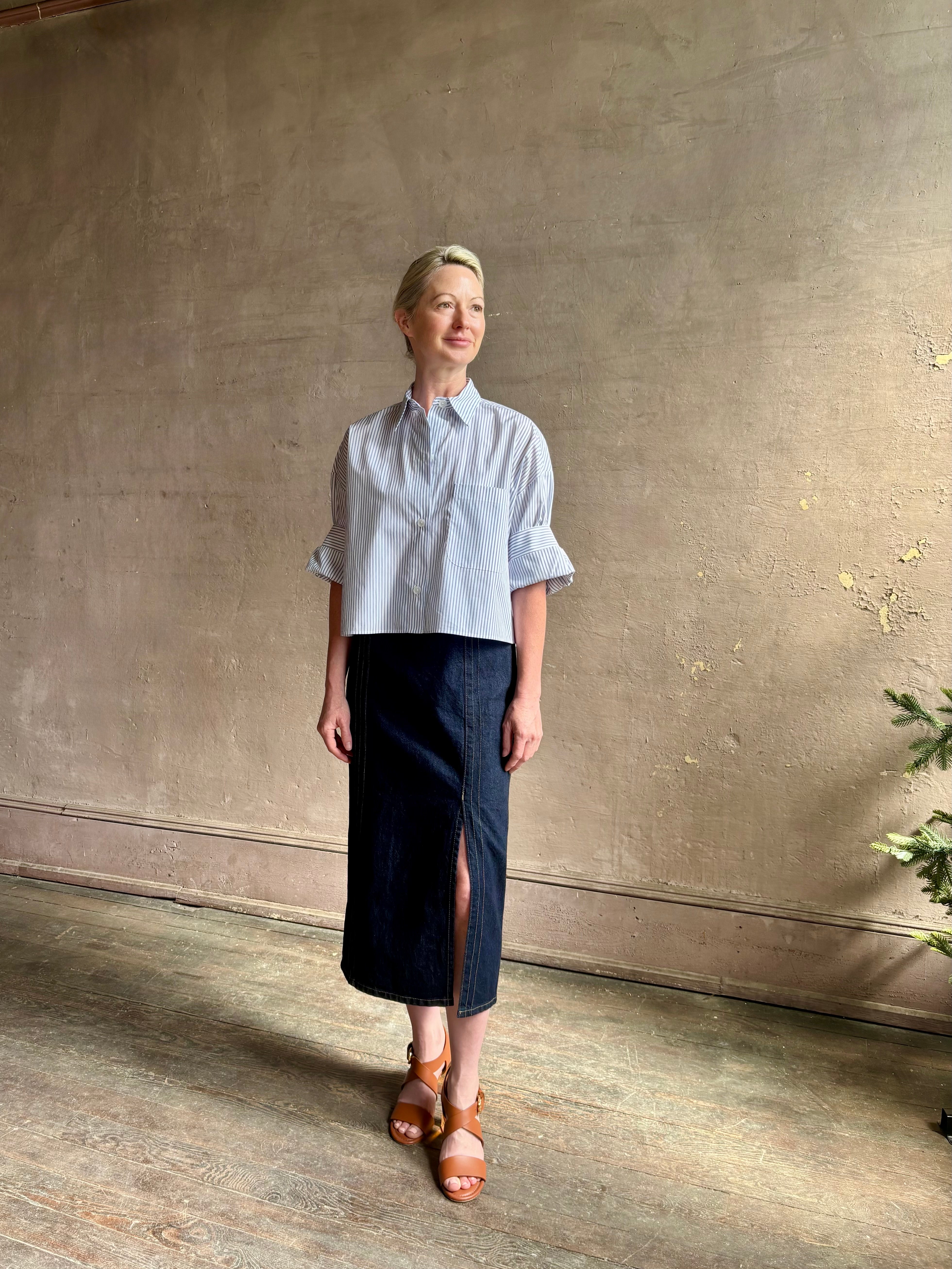Woman wearing luxury cotton poplin TWP Next EX Shirt White and navy stripe with collar button front made in USA