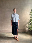 Woman wearing luxury cotton poplin TWP Next EX Shirt White and navy stripe with collar button front made in USA