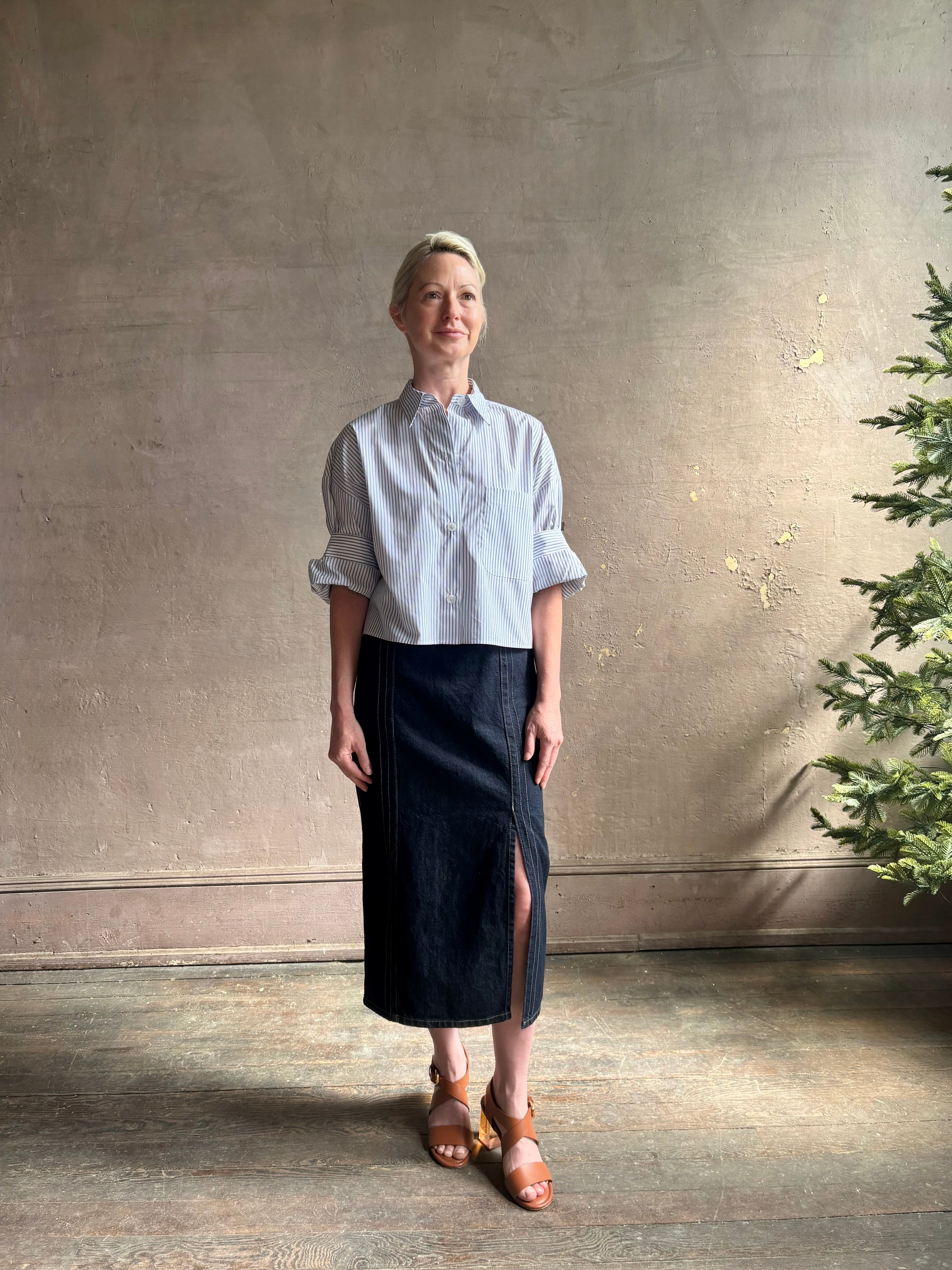 Woman wearing luxury cotton poplin TWP Next EX Shirt White and navy stripe with collar button front made in USA