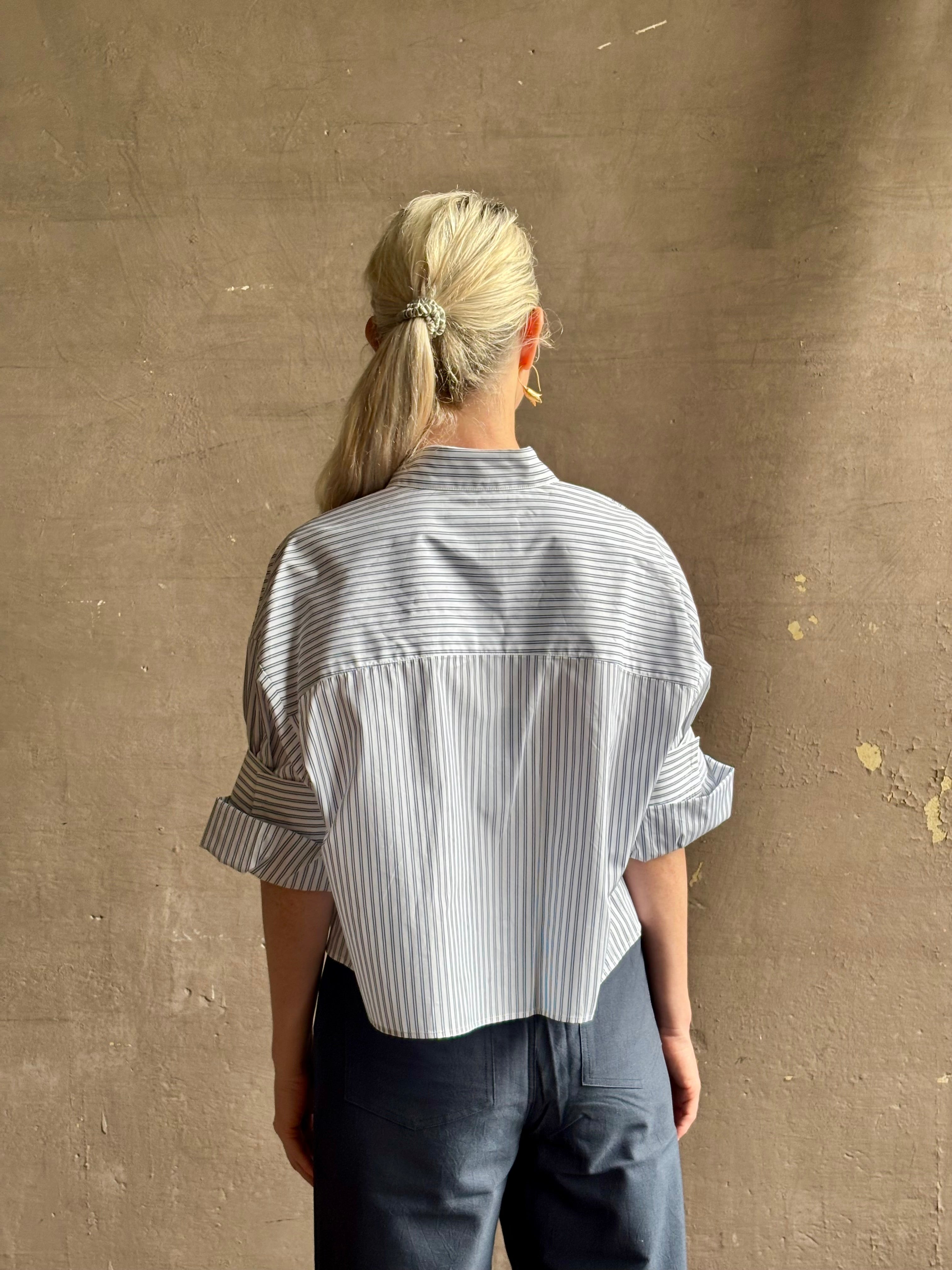Mature woman wearing TWP next Ex cotton poplin shirt button front striped blue and white collar tailored cuffs