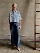 Mature woman wearing TWP next Ex cotton poplin shirt button front striped blue and white collar tailored cuffs