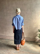 mature model wearing classic cotton poplin button down next ex top by luxury brand TWP in a blue and white 