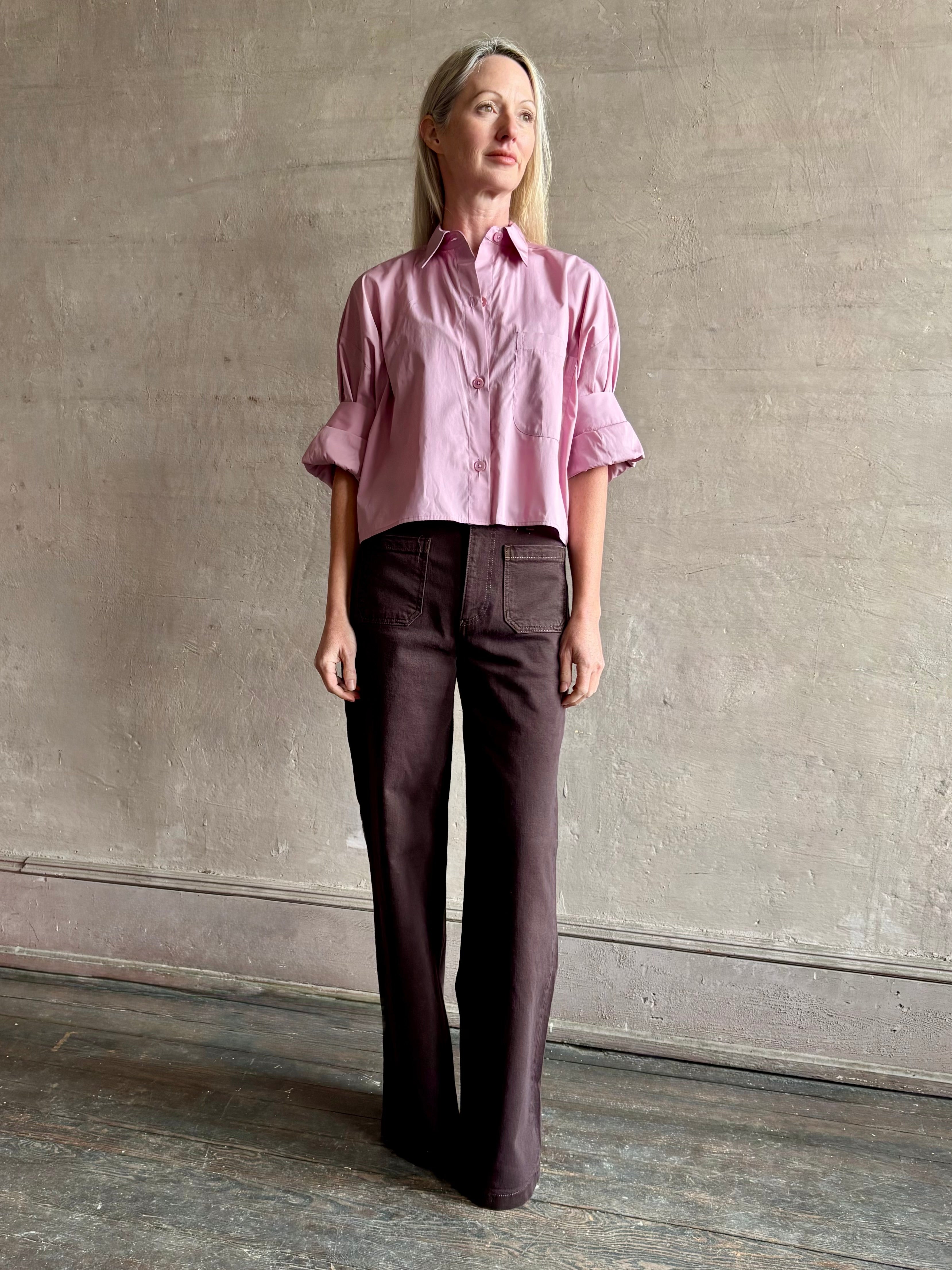 Woman wearing premium cotton TWP Next EX button up cropped shirt with half sleeve in lilac and made in USA