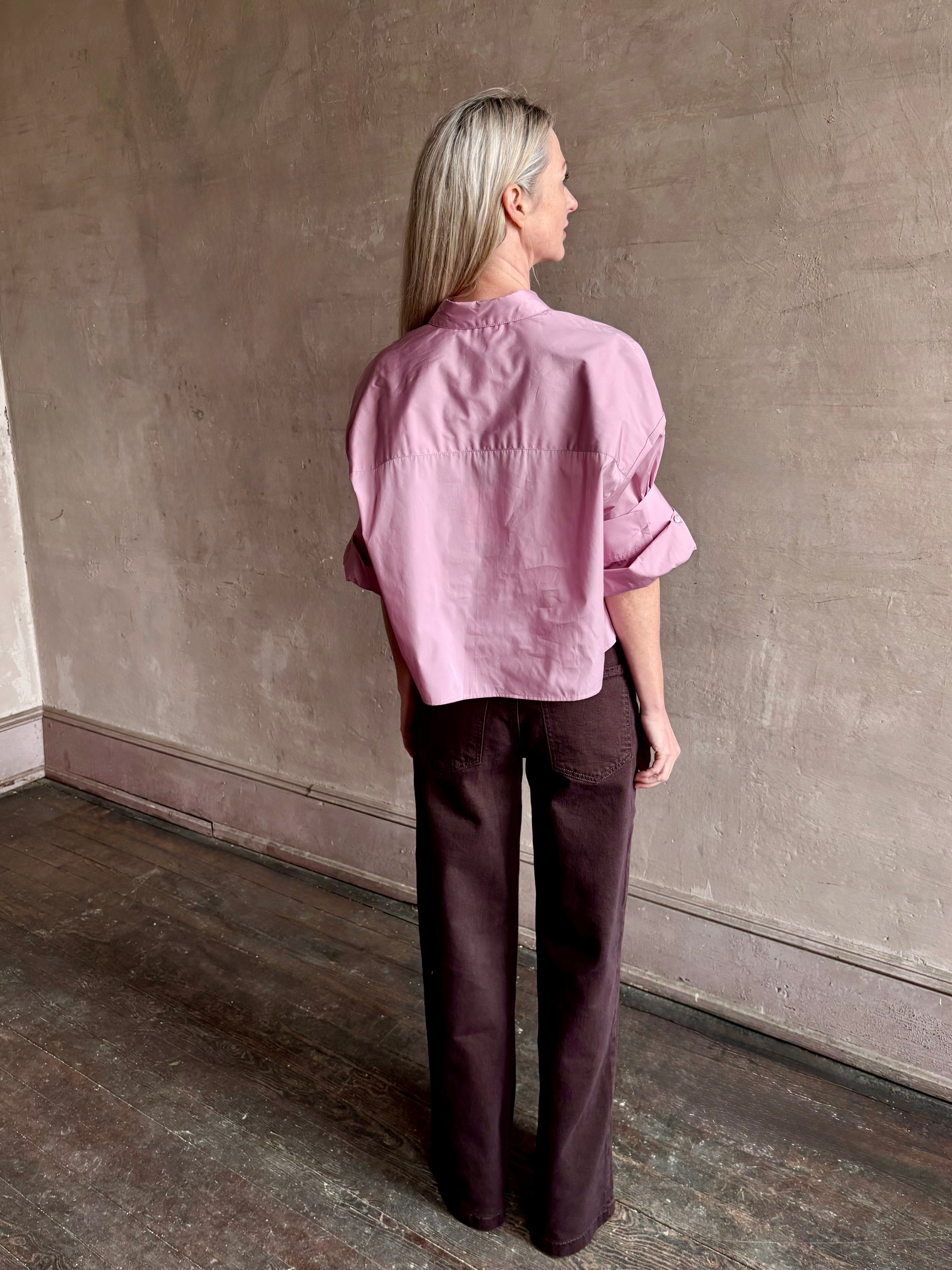 Woman wearing premium cotton TWP Next EX button up cropped shirt with half sleeve in lilac and made in USA