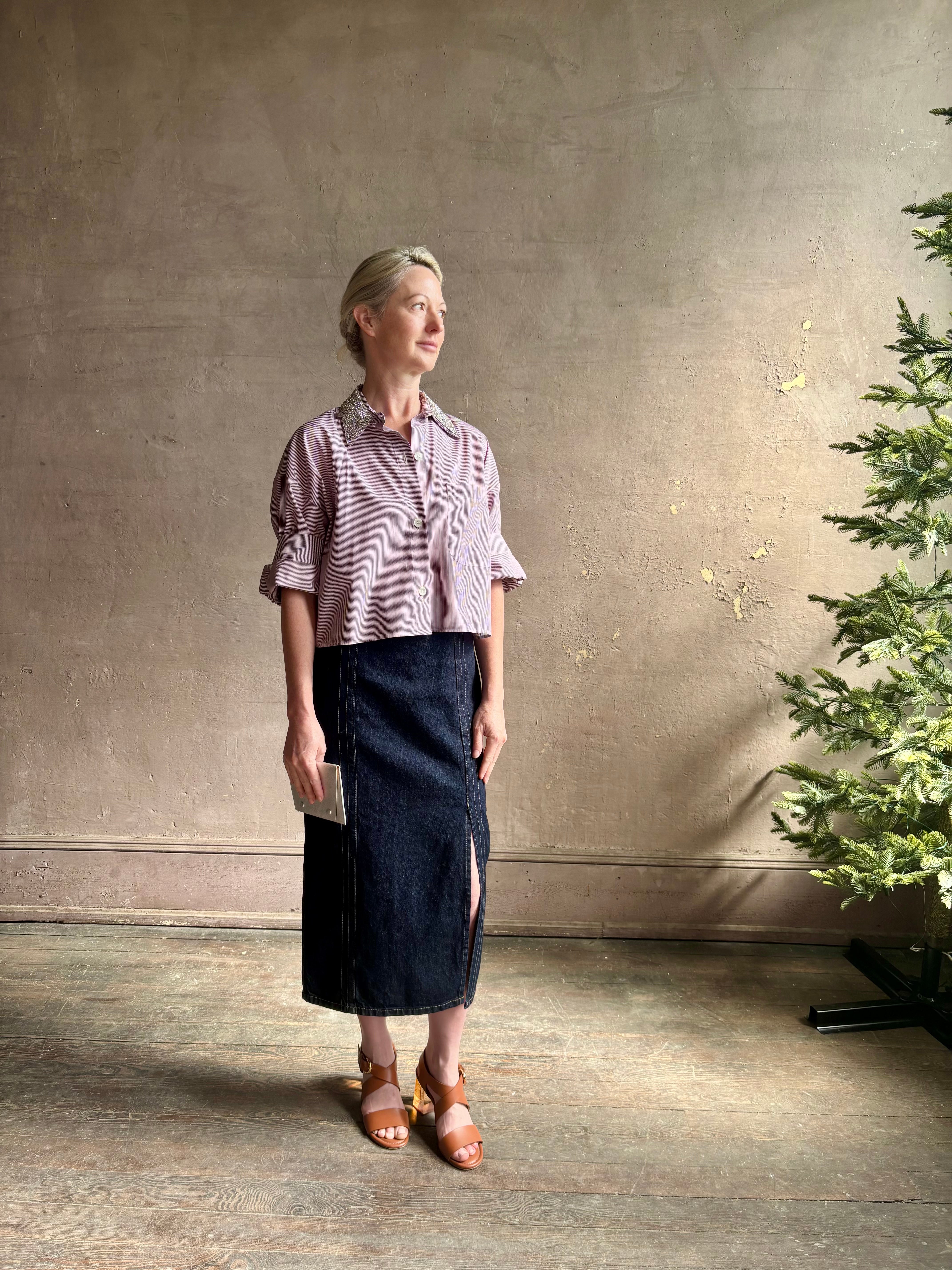 Image of mature woman wearing sophisticated TWP Next EX cotton shirt with elevated Crystal embellished Collar in White and wine stripe made in USA