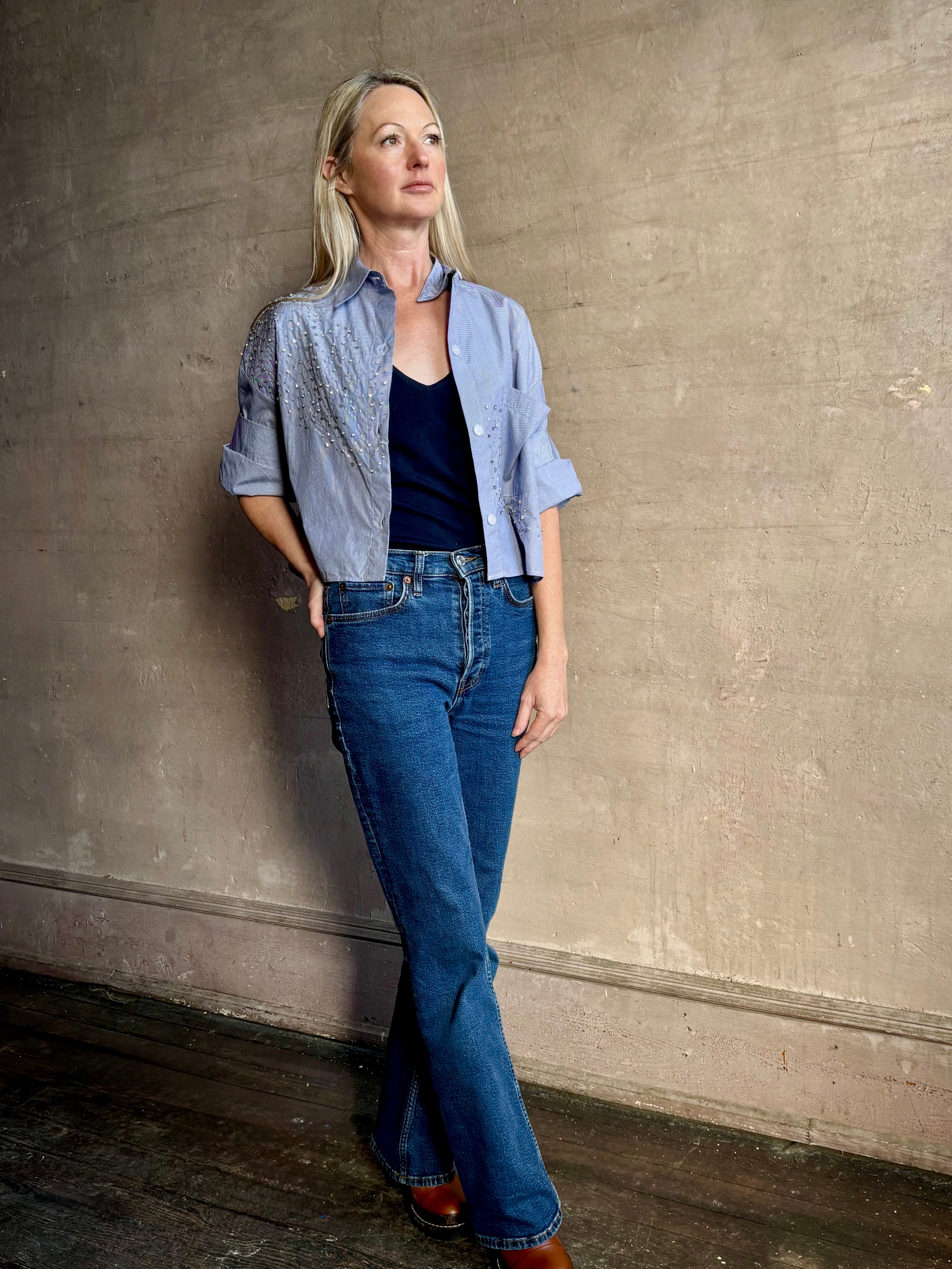 Image of woman wearing premium cotton TWP Next EX Crystal-Embellished blue and white striped Shirt