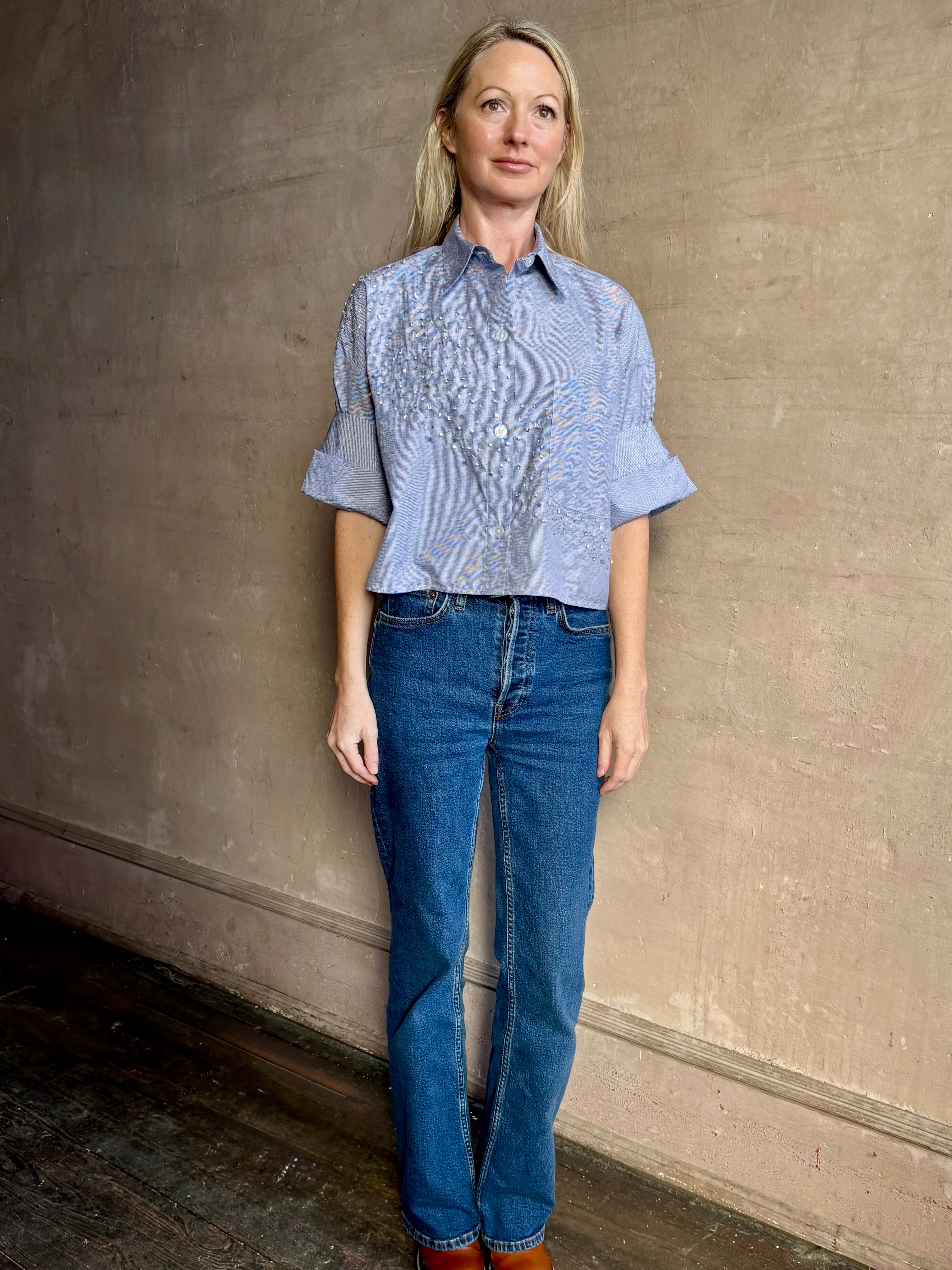 Image of woman wearing premium cotton TWP Next EX Crystal-Embellished blue and white striped Shirt