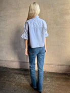Image of woman wearing premium cotton TWP Next EX Crystal-Embellished blue and white striped Shirt