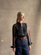 Mature woman wearing TWP Peyton sheer Silk Blouse tuxedo tailored silhouette Timeless, occassion ready 