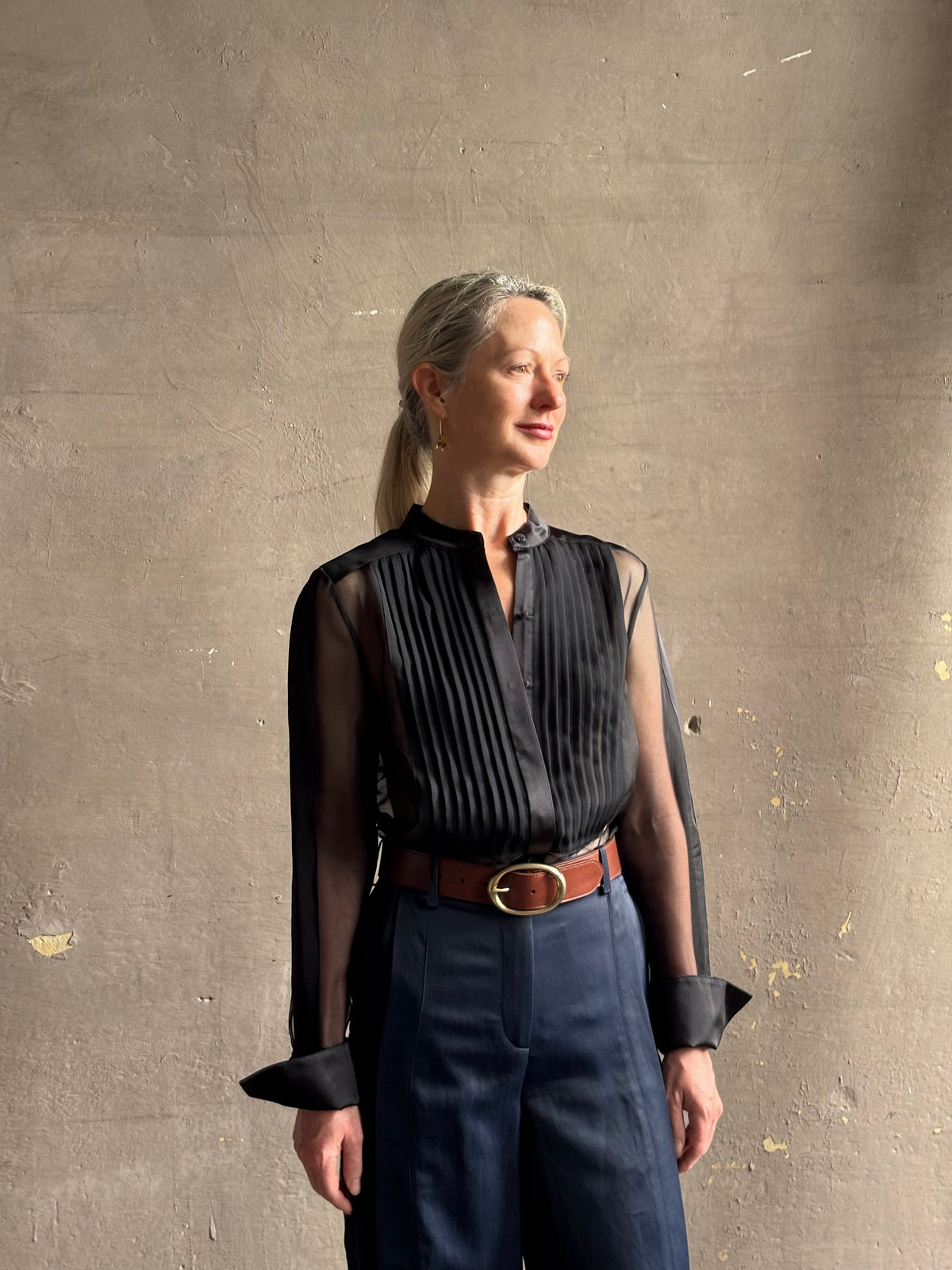 Mature woman wearing TWP Peyton sheer Silk Blouse tuxedo tailored silhouette Timeless, occassion ready 
