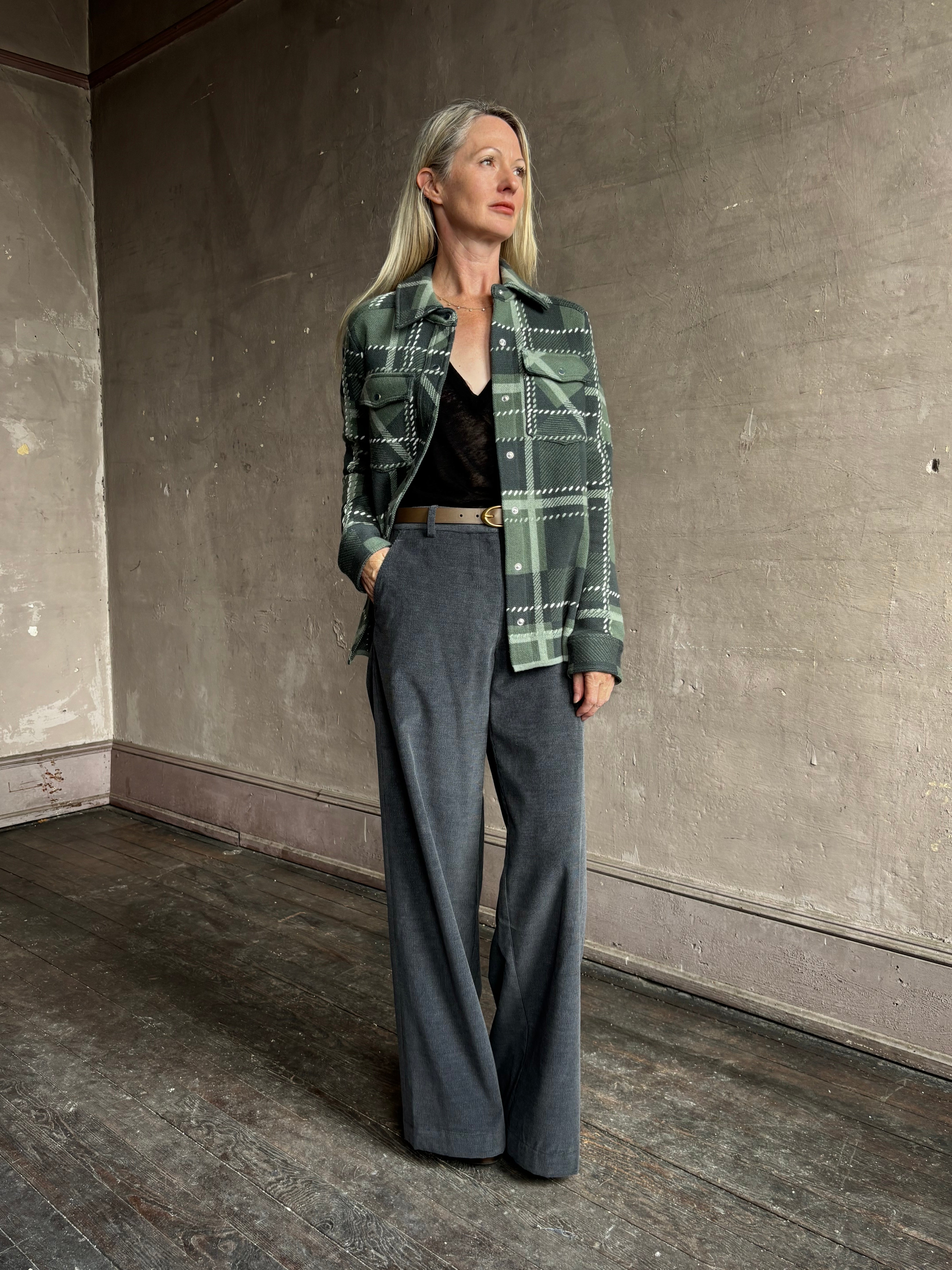 Image of mature woman wearing TWP ranchers cardigan with mountain-inspired comfort. 