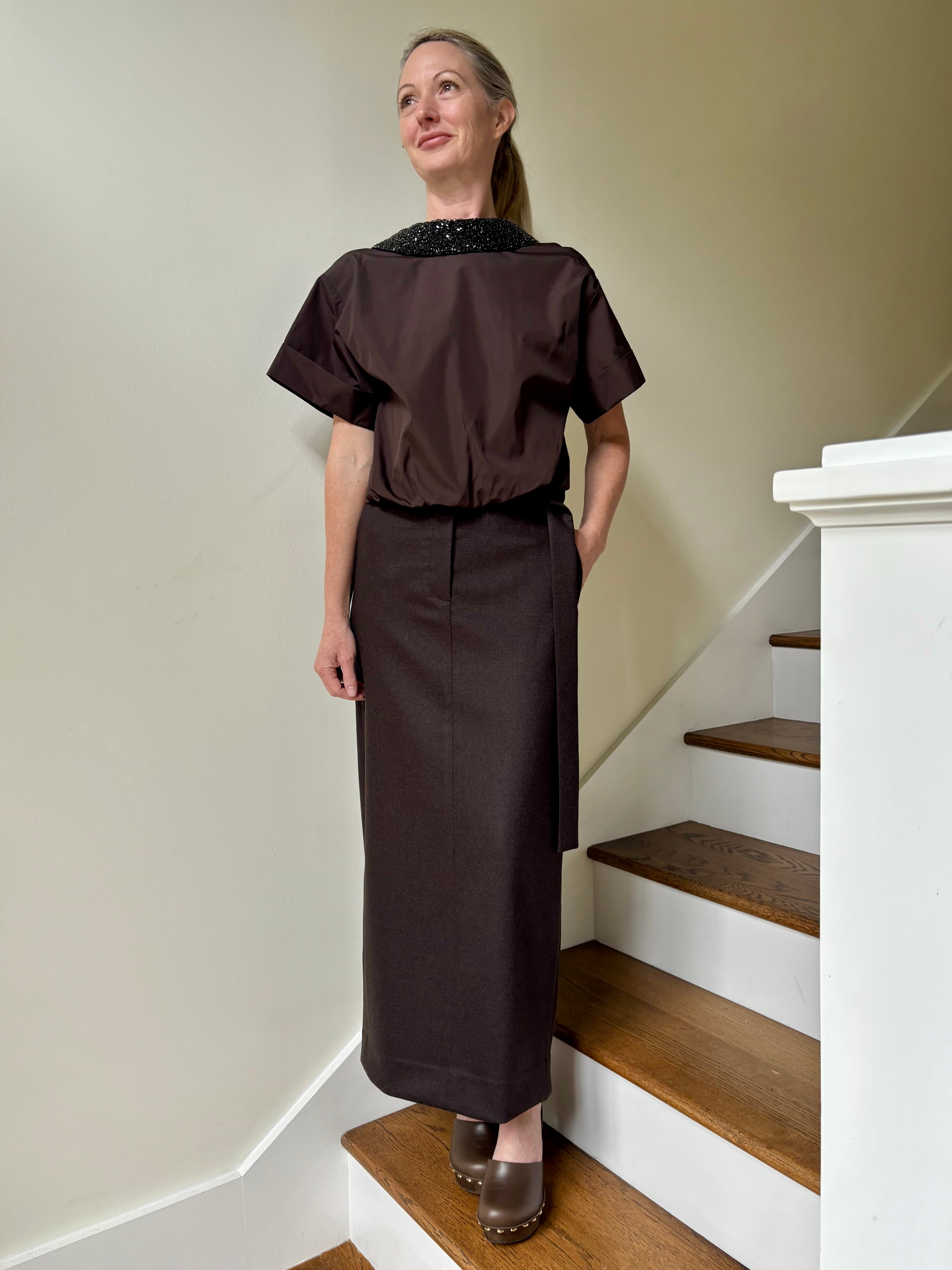 Image of mature woman wearing TWP tailored Slit maxi Skirt in Chocolate brown in a Premium Wool Cashmere Blend and American-Made 