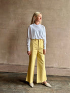 Image of mature woman wearing lightweight TWP from Premium Supima Cotton for exceptional softness with long sleeves and crew neck