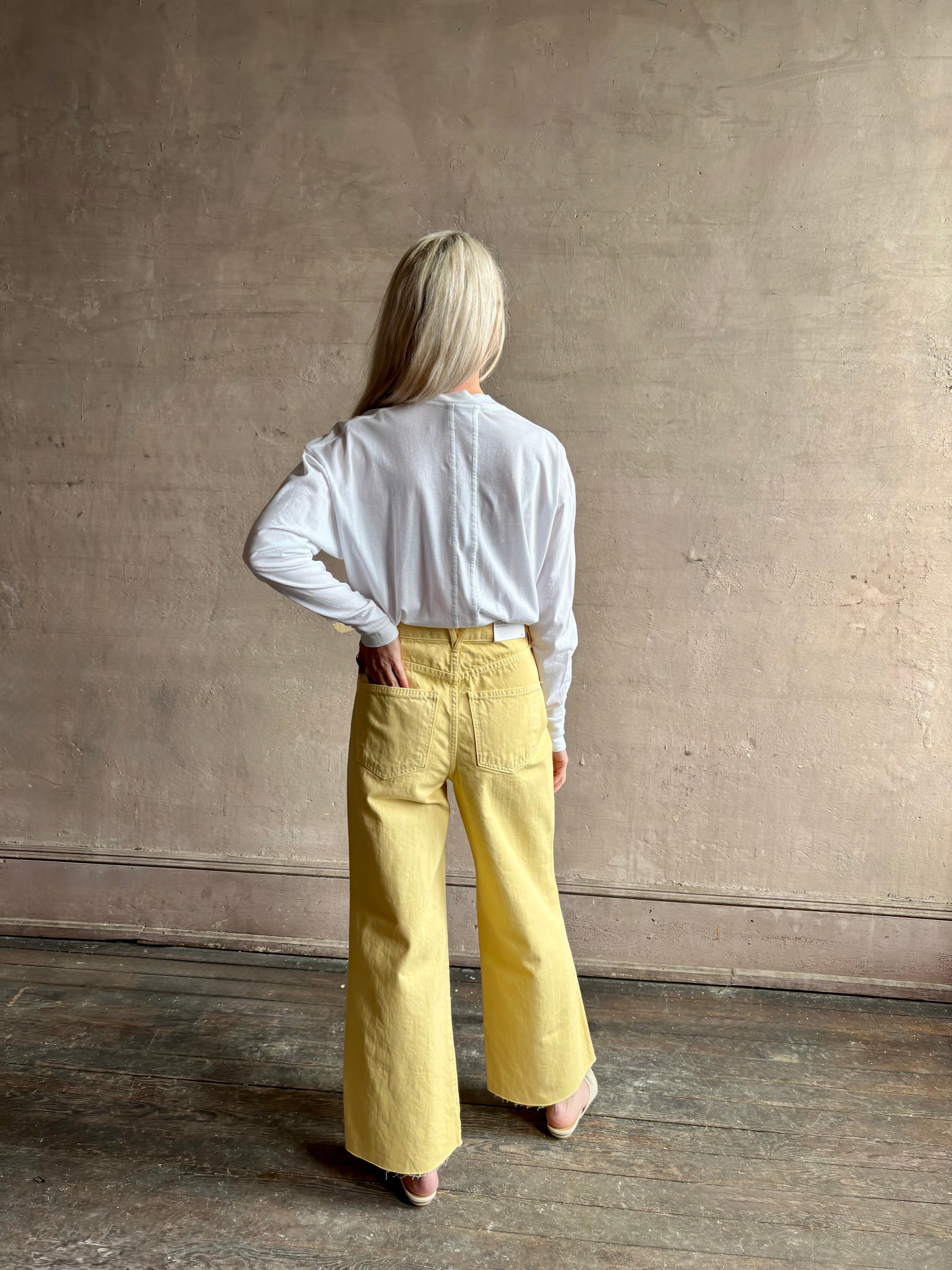 Image of mature woman wearing lightweight TWP from Premium Supima Cotton for exceptional softness with long sleeves and crew neck