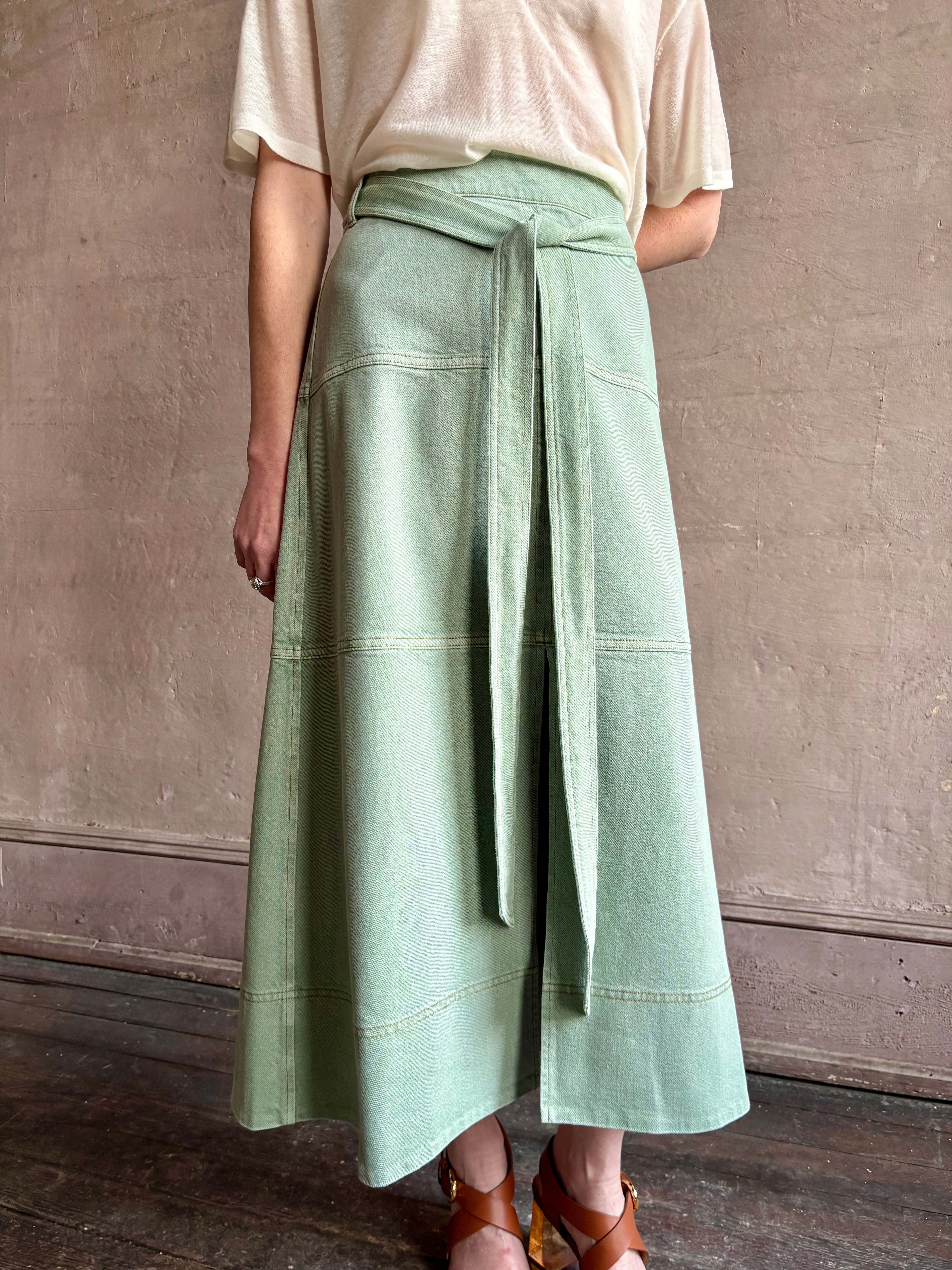 Mature woman wearing premium designer Tanya Taylor Hudley lightweight cotton maxi A-line Skirt in Pistachio green