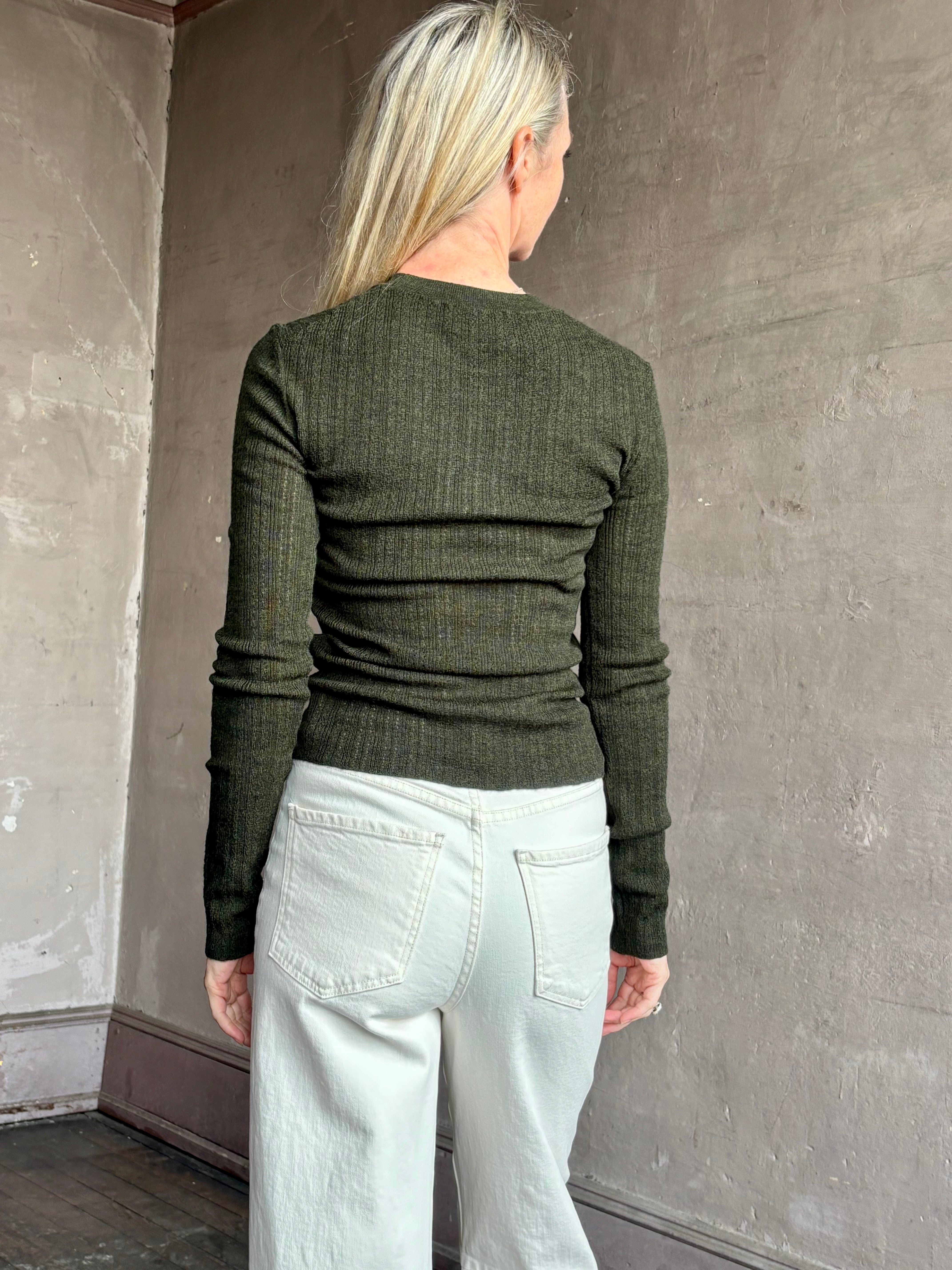 Image of mature woman wearing designer TANYA TAYLOR Crew Neck Kayden merino wool Knit Top in sophisticated heathered Green
