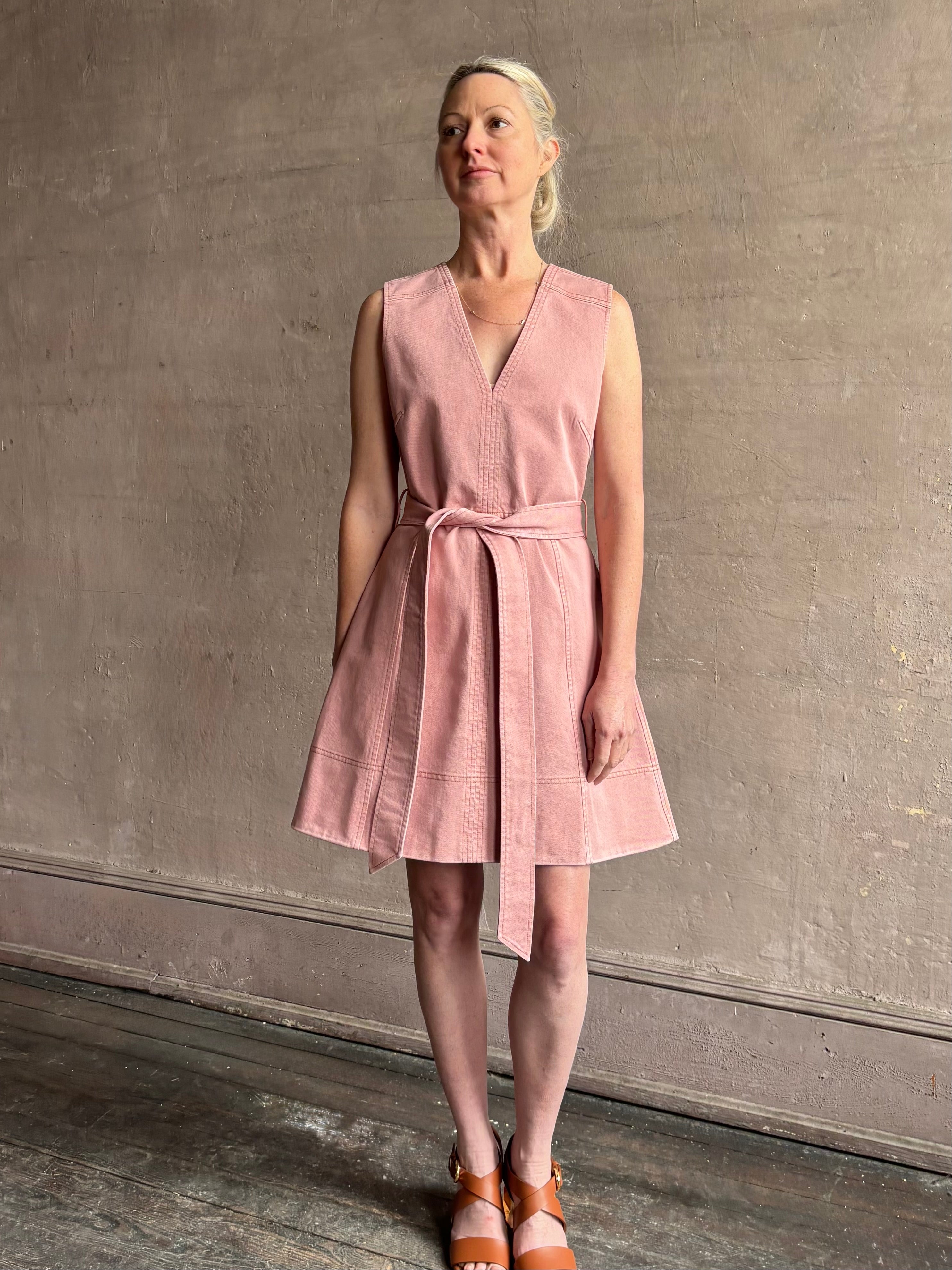 mature woman wearing designer Tanya Taylor Reina elevated casual cotton denim  Dress with v-neck and expert tailoring