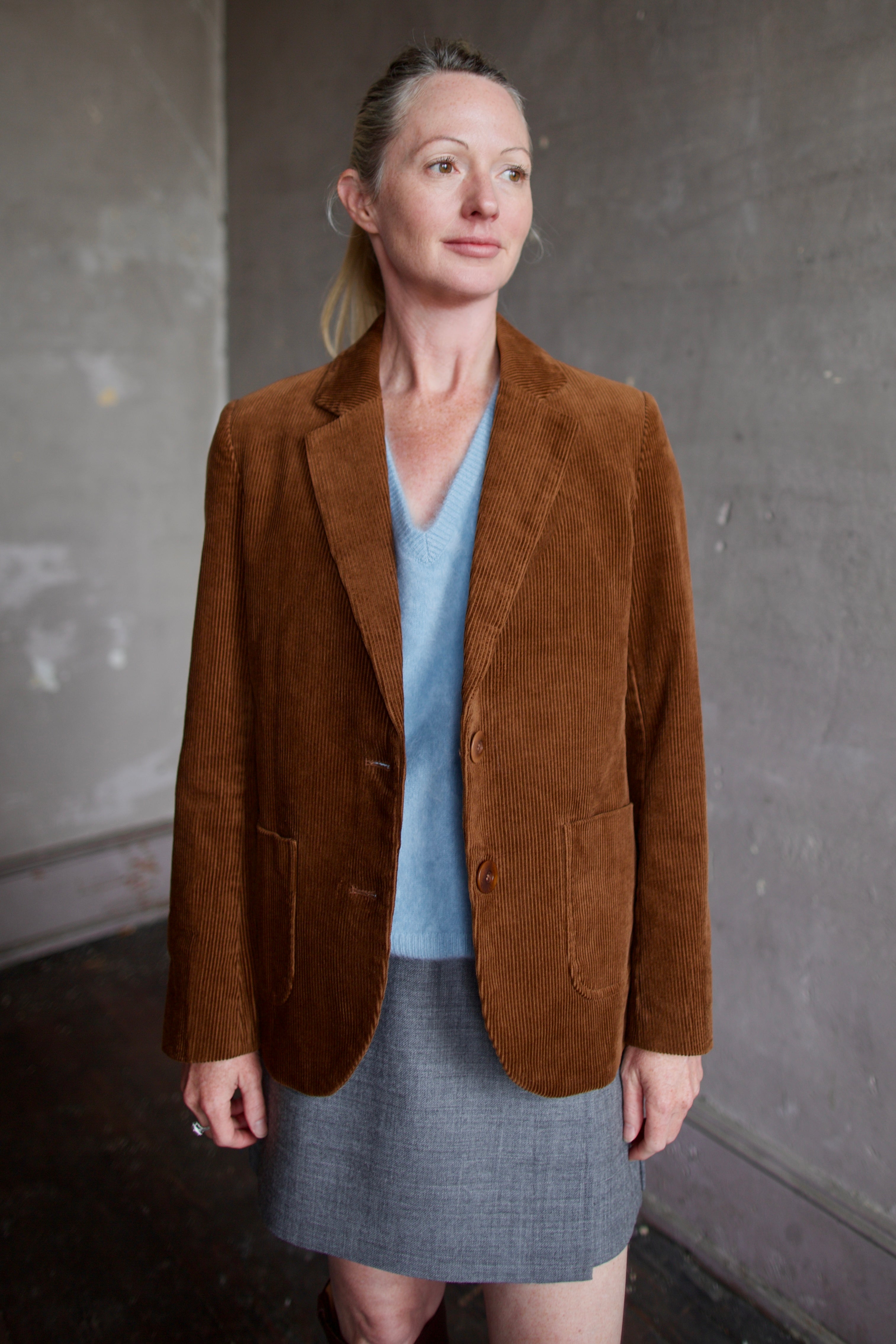 Model wearing the Trovata Skylar brown cotton corduroy blazer over Lisa Yang brushed cashmere sweater