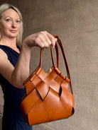 Image of designer ULLA JOHNSON Charlotte premium woven leather Crossbody in sophisticated medium brown