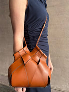 Image of designer ULLA JOHNSON Charlotte premium woven leather Crossbody in sophisticated medium brown
