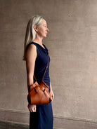 Image of designer ULLA JOHNSON Charlotte premium woven leather Crossbody in sophisticated medium brown