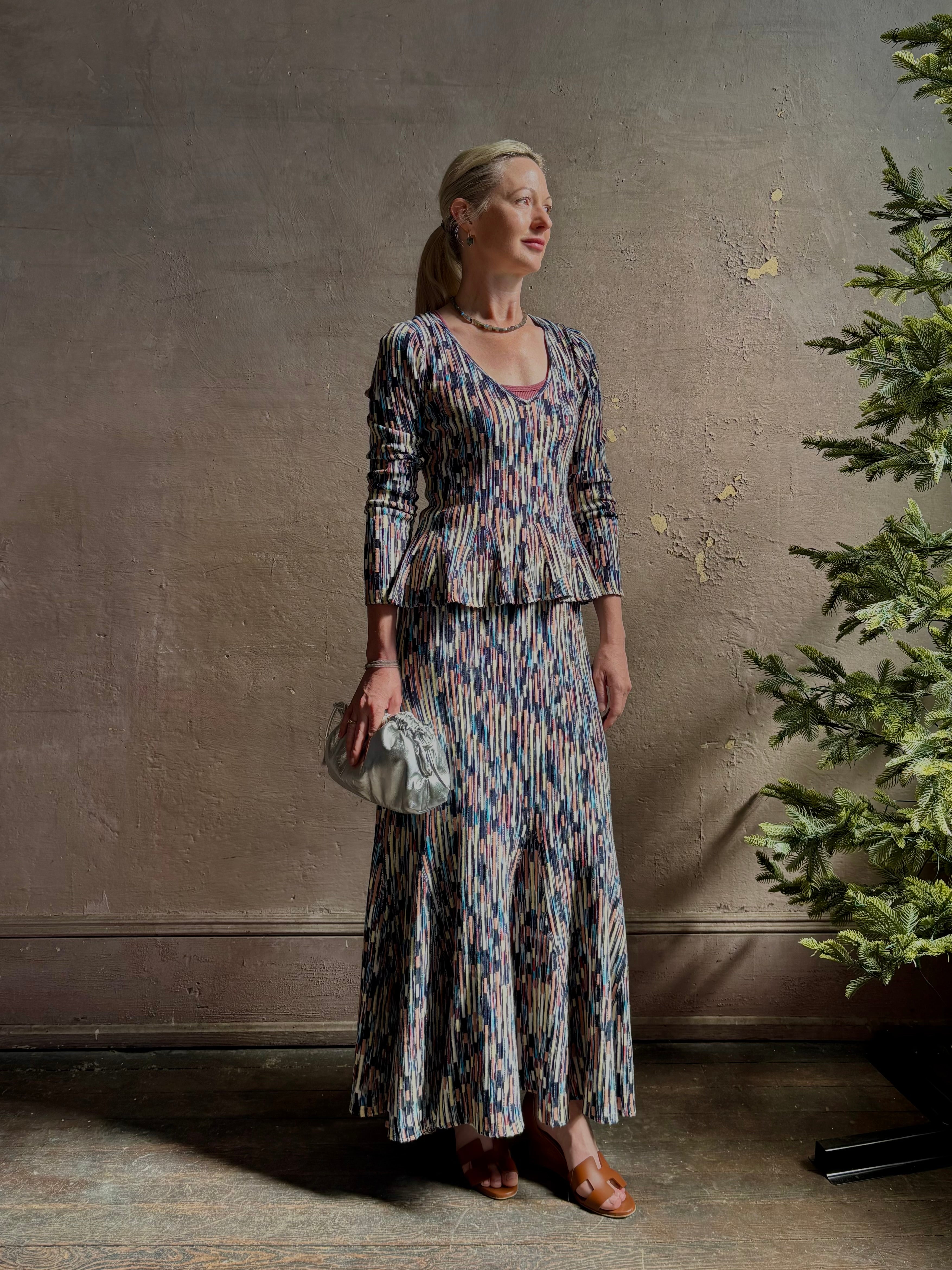Mature woman wearing Ulla Johnson Marceline maxi knit cotton Skirt women's designer knit skirt Oasis colorway