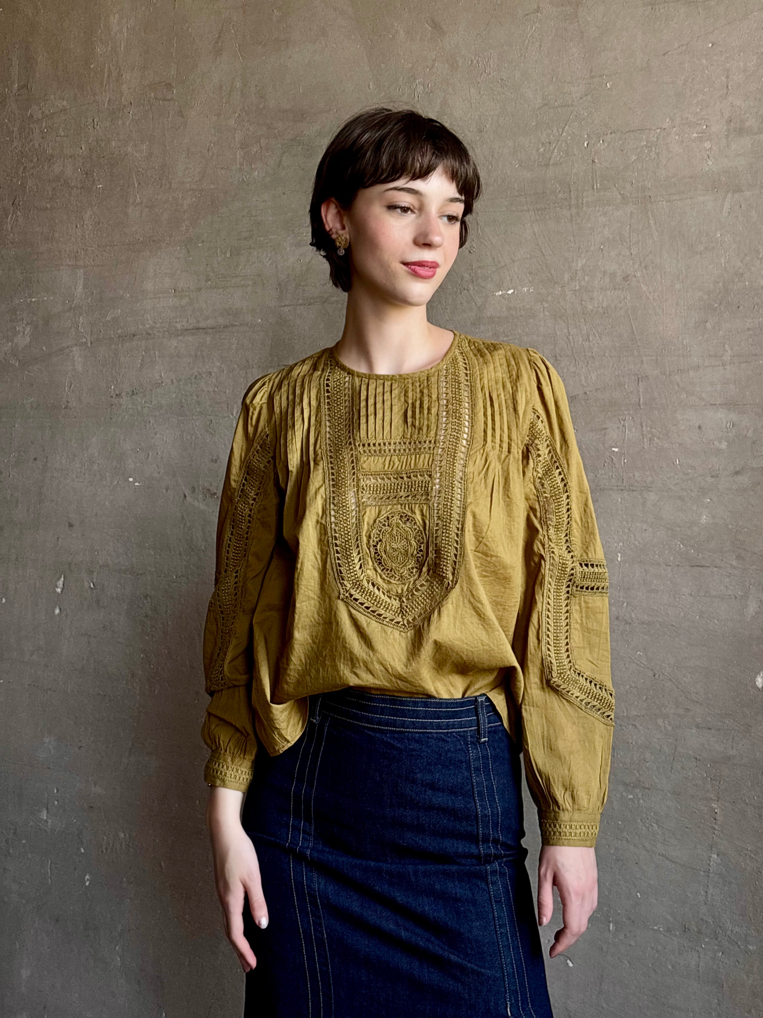 Ulla Johnson Marlowe Long Sleeve Cotton Top in muted green with pintucking and intricate lace crochet 