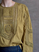 Ulla Johnson Marlowe Long Sleeve Cotton Top in muted green with pintucking and intricate lace crochet 