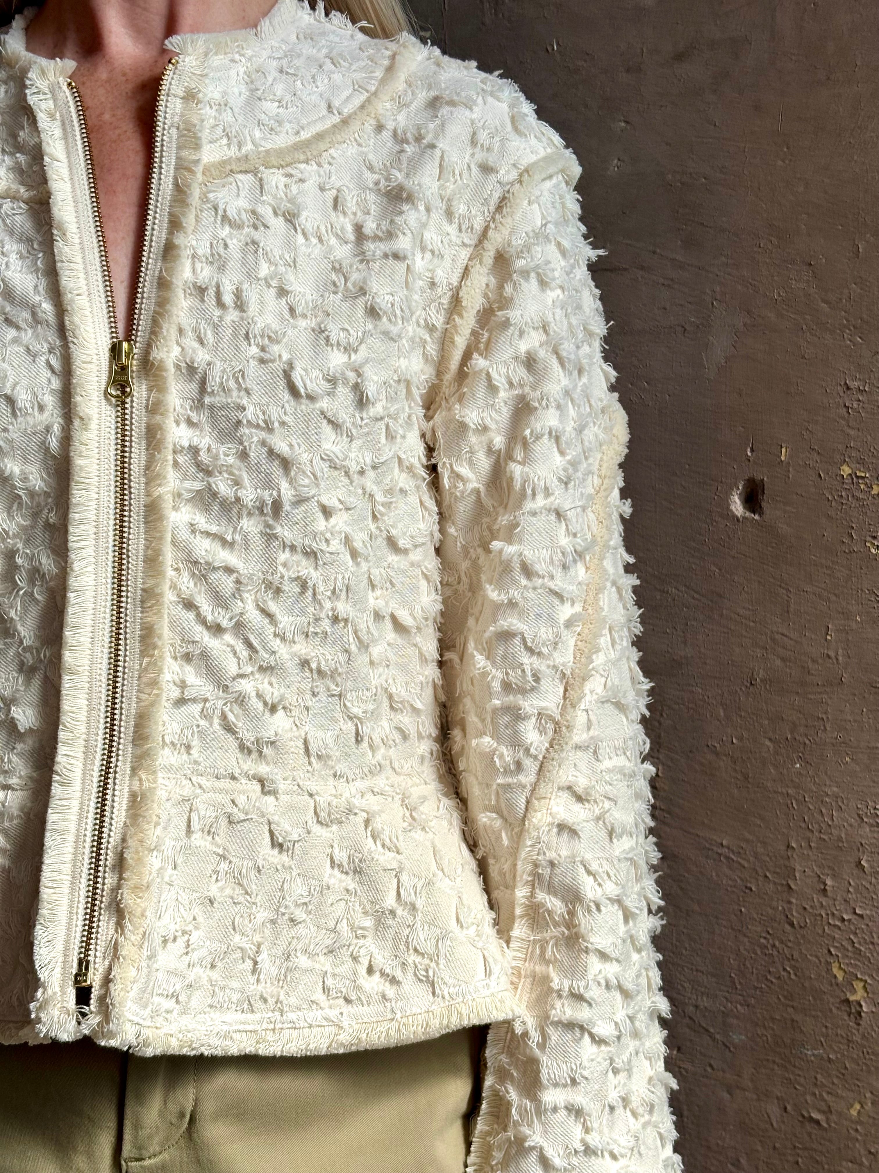 woman wearing designer Ulla Johnson Rosalind tailored peplum cotton zip up Jacket checkered fringe texture