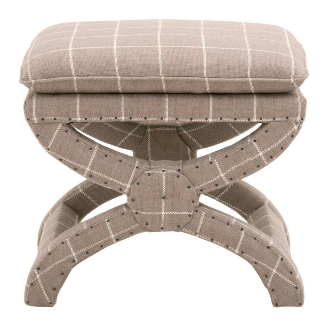 gray ottoman with a fixed pillow top seat cushion and a windowpane pattern fabric on a curved 'X' base 