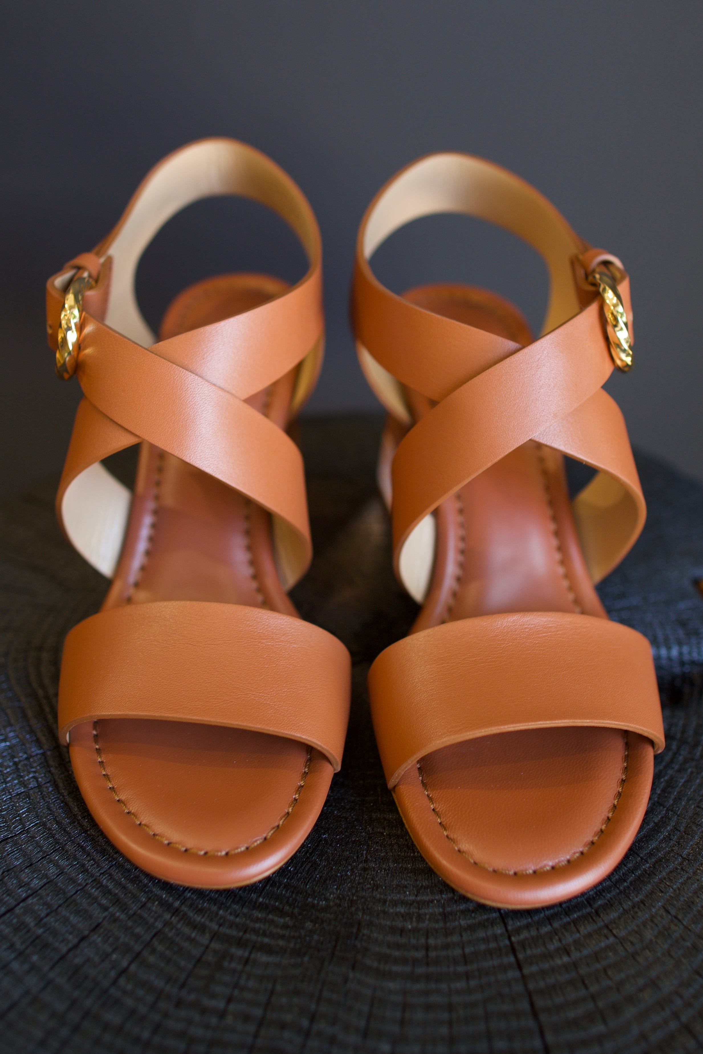 Image of luxury designer Ulla Johnson brown leather Elora Heels with premium comfort and sophisticated criss cross strap design