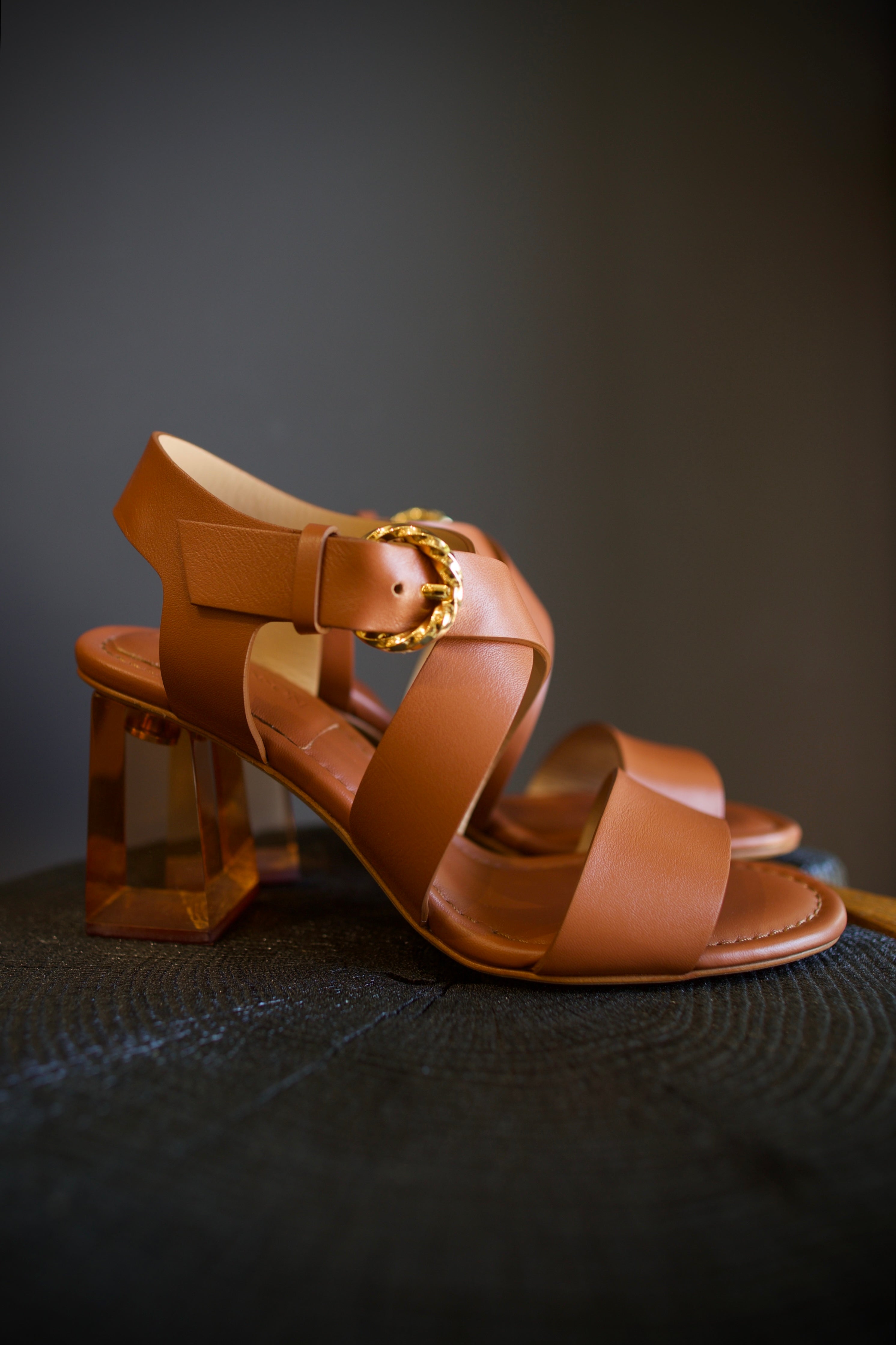 Ulla Johnson Elora Heels in Terra supple leather criss cross straps 3.25" lucite block heel. Sculptural, bohemian-inspired elegance